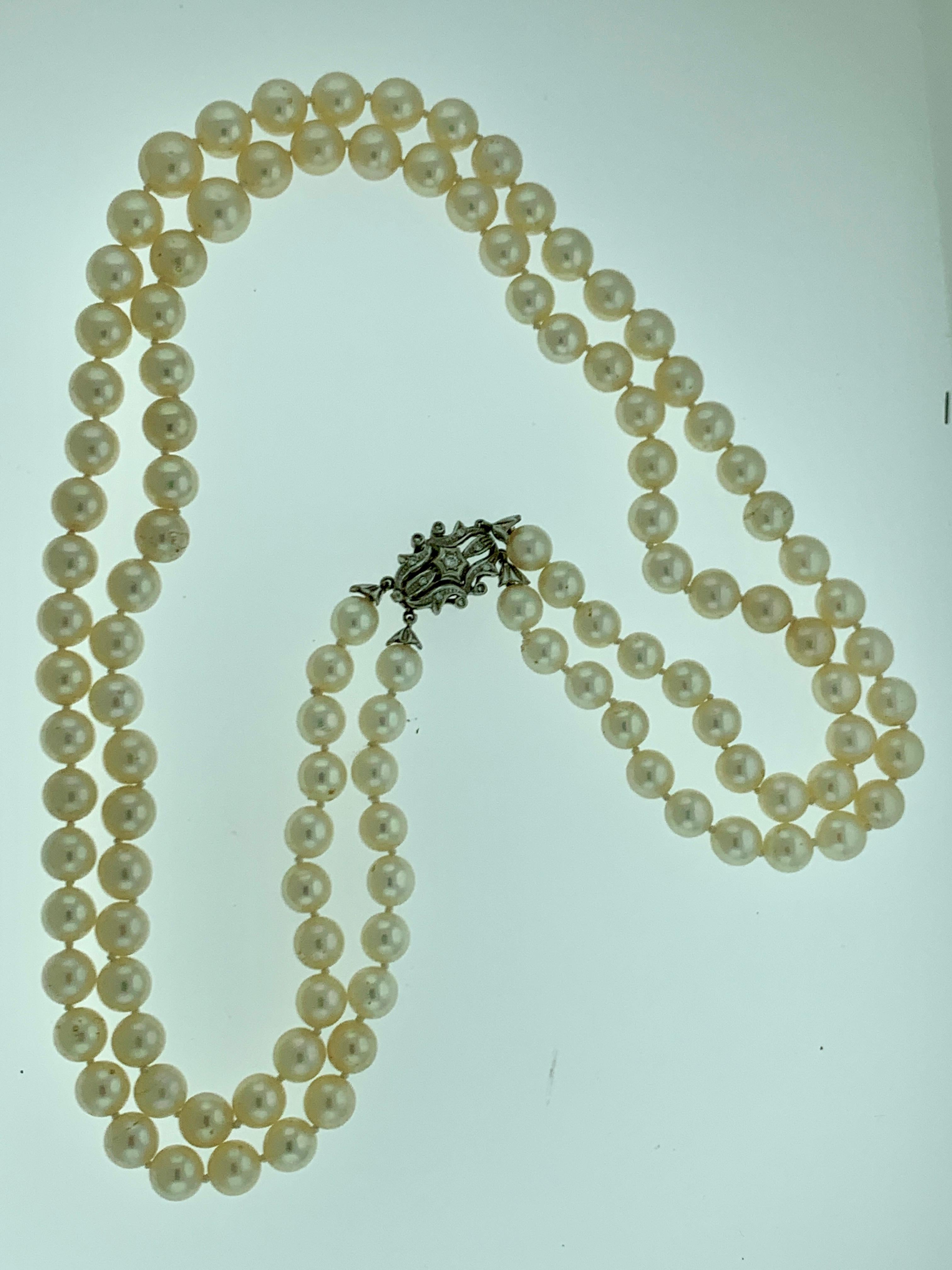 Round Cut Vintage Pearl Double Strand Necklace with Diamond and Gold Clasp