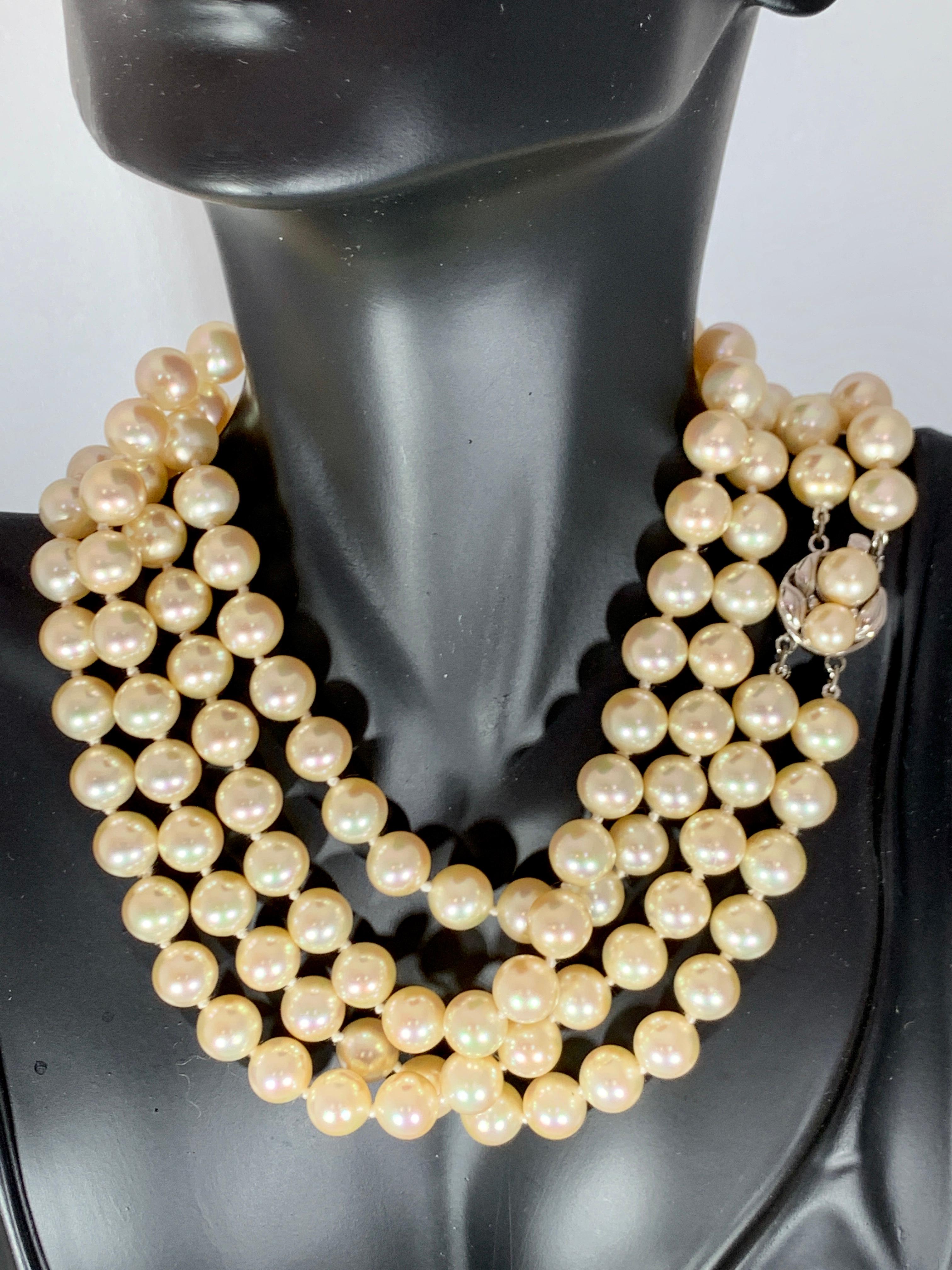 This marvelous vintage Pearl necklace features 2 row of luscious  Japanese Akoya   pearls
(measuring approx. 8.25mm -8. 75mm)   Pearl Gemstone in the clasp.
Cremish Yellow color
VINTAGE

PRE-OWNED 
 ESTATE PIECE
Sterling Silver Clasp
Clasp is