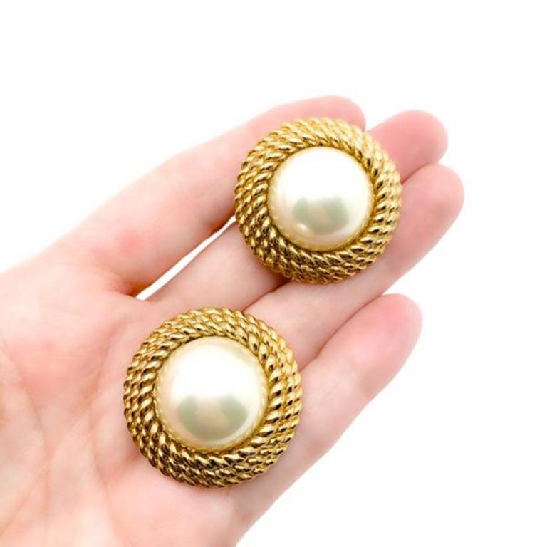 Vintage Pearl Rope Earrings. If ever there was a Queen of classics. It is probably this. We have Coco Chanel to thank for the much revered and eternally stylish gold and pearl nest earring. This high quality pair of earrings are crafted from gold