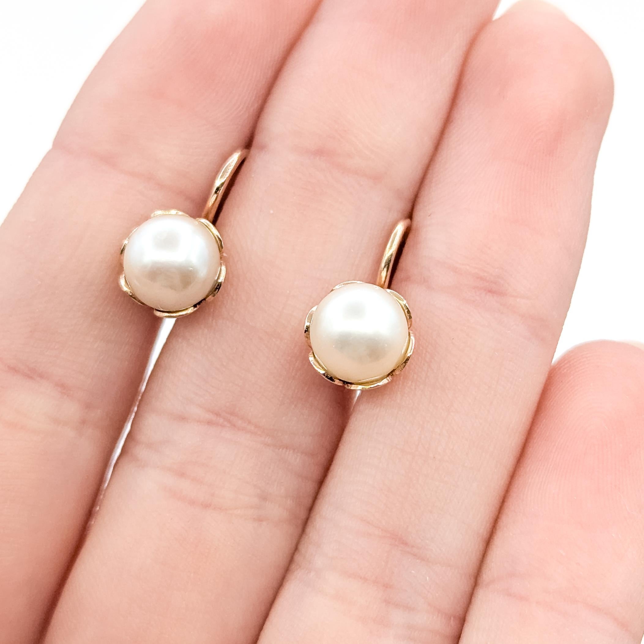Contemporary Vintage Pearl Lever Back Earrings in 14k yellow gold For Sale