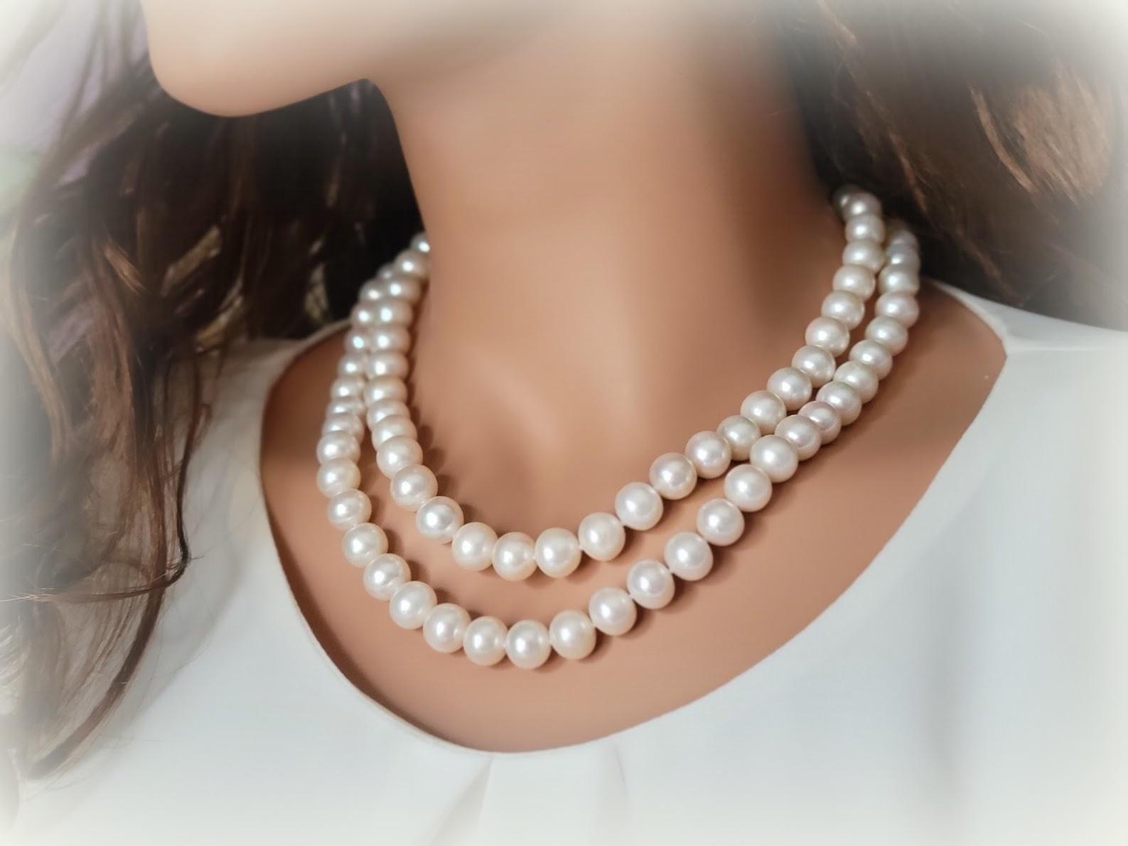 Finished with a sterling silver clasp with genuine freshwater pearls are lustrous Freshwater cultured pearls, double knotted in two rows on white silk. This 18.5-inch double-strand Freshwater pearl necklace is perfect for infusing a touch of