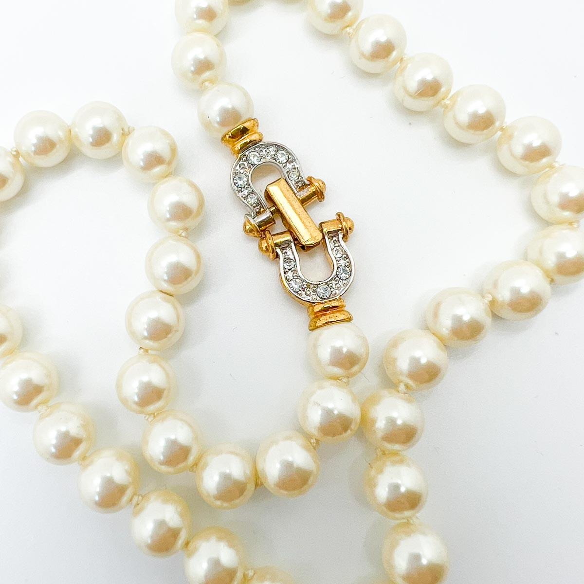 A demure and timeless Vintage Pearl Horseshoe Necklace. Perfect pearls paired with a horseshoe inspired crystal clasp makes this one a perfect jewel box classic or delightful gift.
An unsigned beauty. A rare treasure. Just because a jewel doesn’t