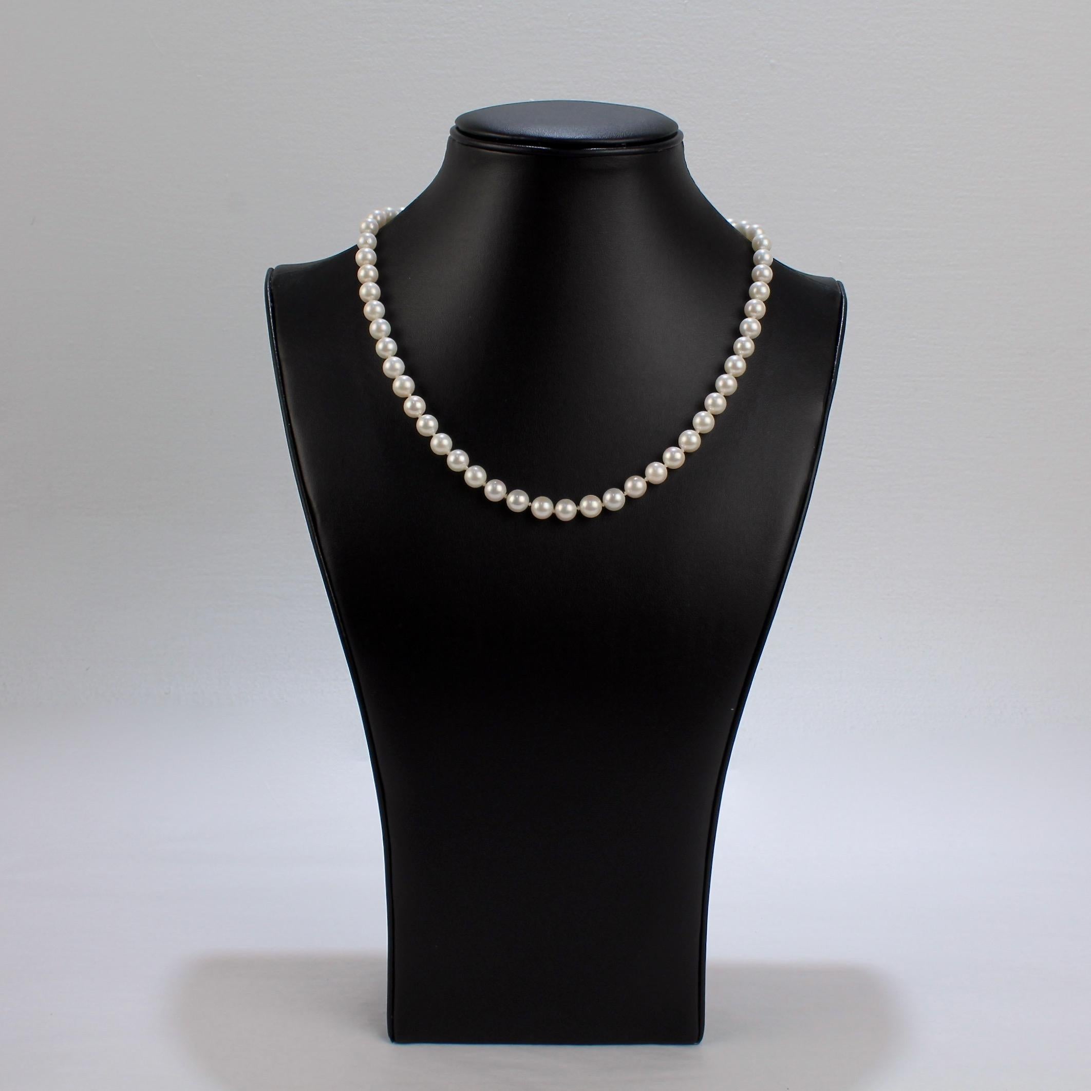 Round Cut Vintage Pearl Strand Necklace with Cultured Pearls and a 14 Karat Gold Clasp