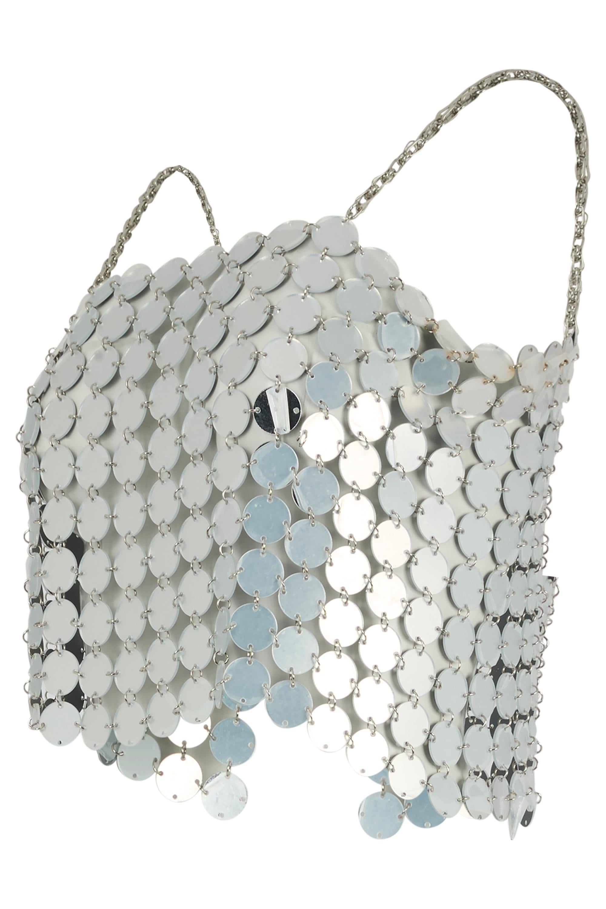 Top vintage anni '80 Pedro Rodriguez Chain Silver. Realizzato con acetato rotondo e metallo  mulino a catena. Materiale riflettente in stile specchio. Cinghie a catena. Chiusura frontale in metallo. In eccellenti condizioni vintage.

Marchio: Pedro