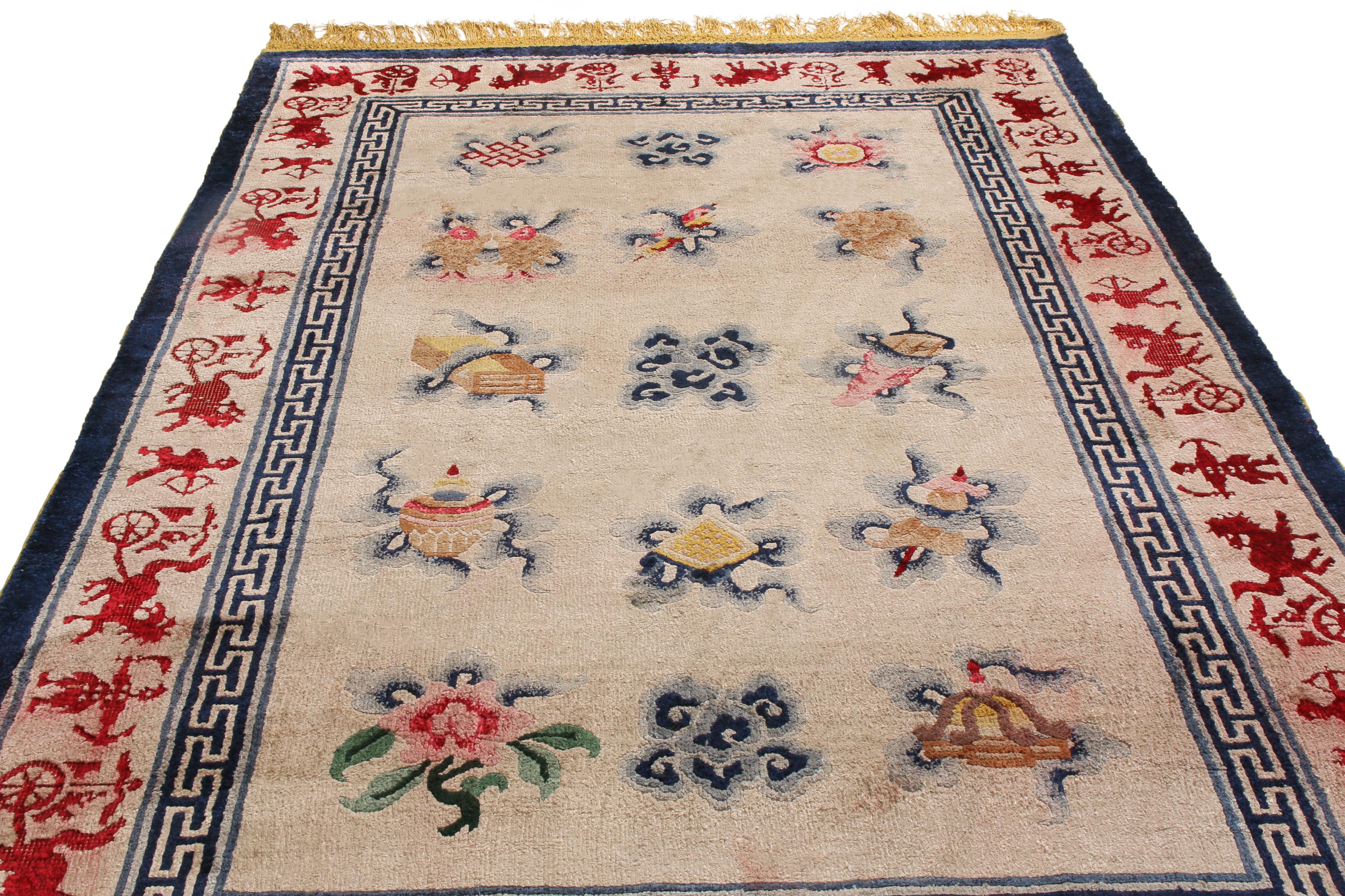 Originating from China between 1960, this antique traditional Peking rug is one of a select design featuring rich, repeated character symbols in its middle border. Hand knotted in high quality silk with subtle, luminous texture, the cream pink