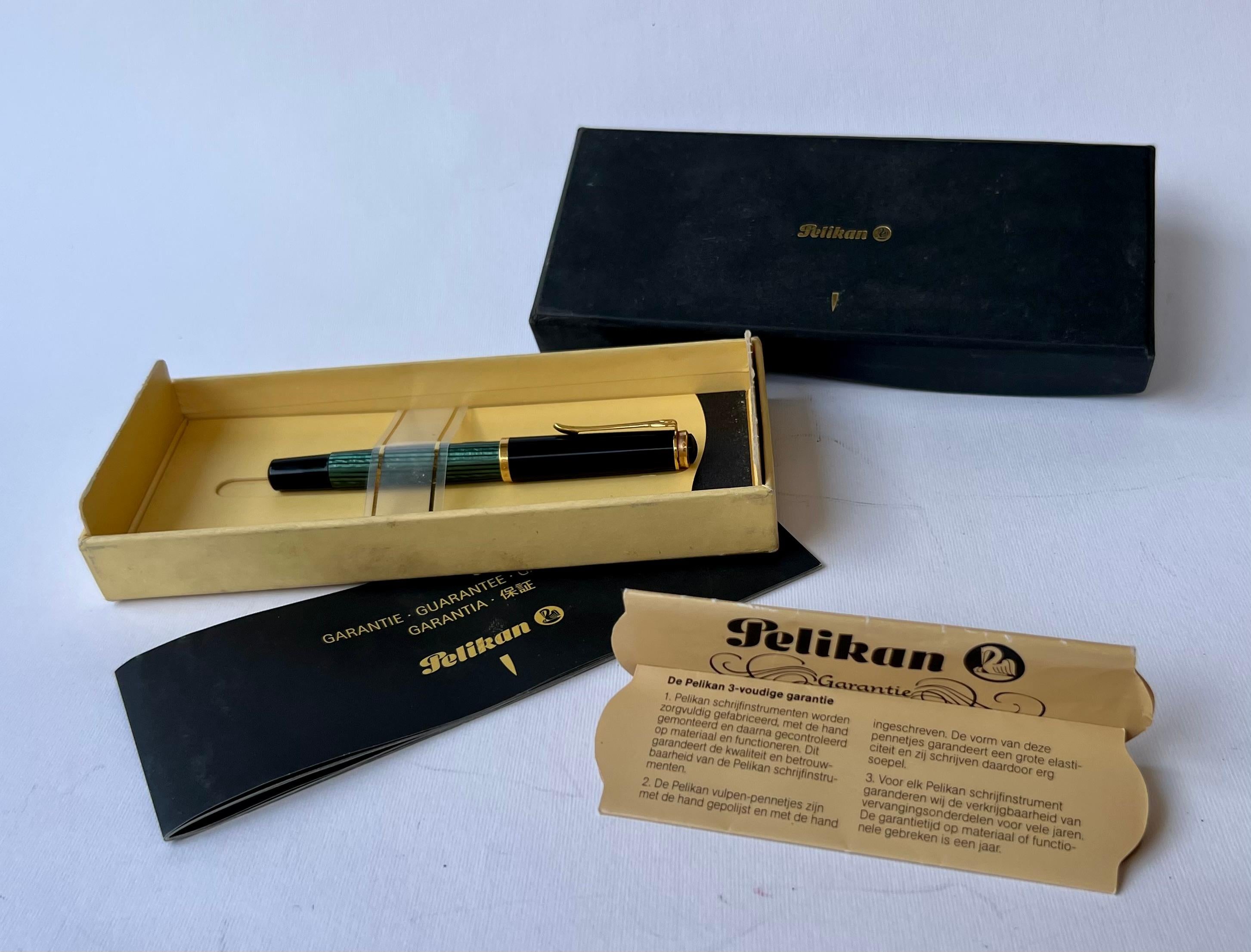 For your consideration a very nice he pen was manufactured in Germany and has a 14K FINE NIB. The M585 is the smallest and lightest of Pelikan's flagship Souveran line, which makes it great for someone with smaller hands. The pen has a piston