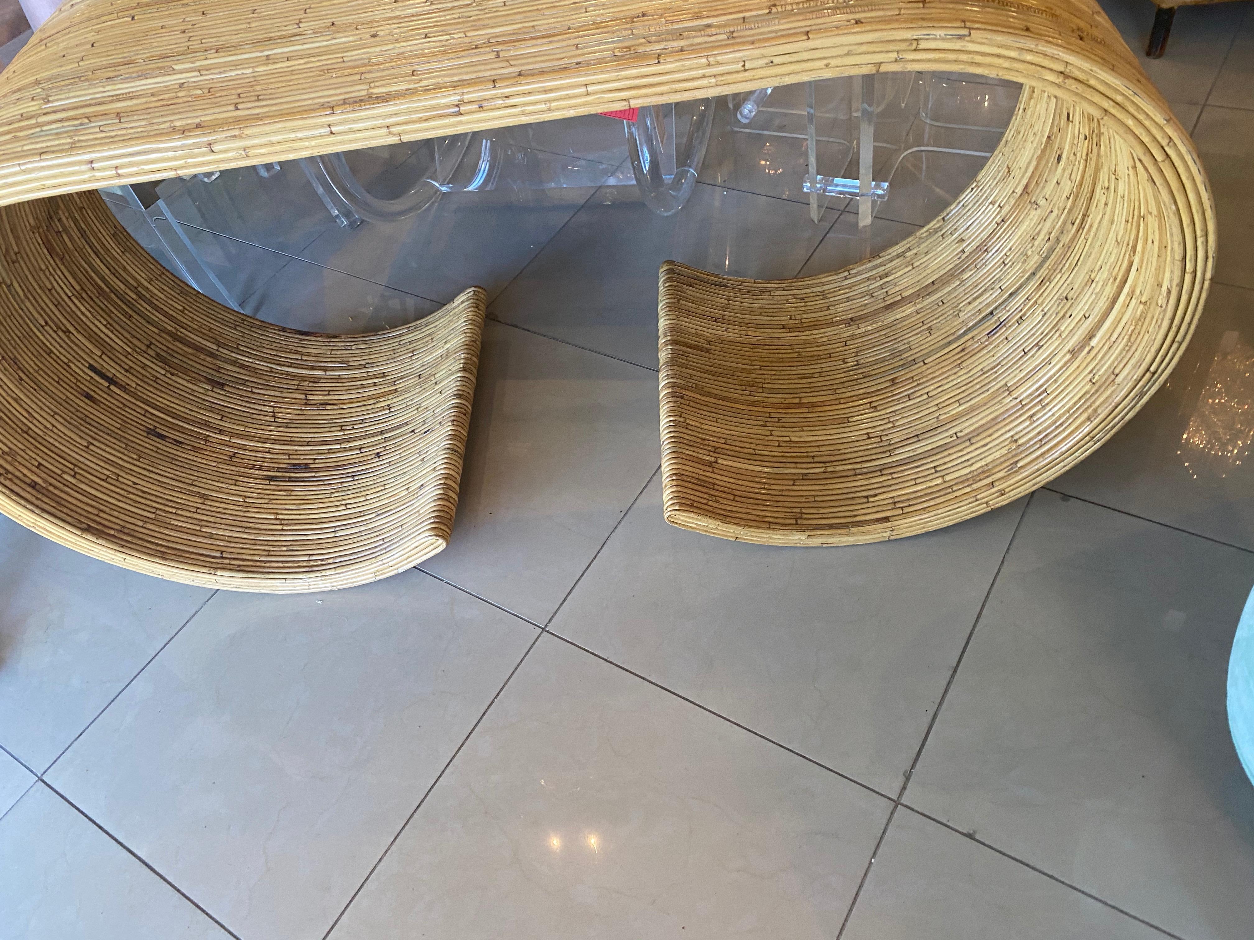 Such an amazing vintage pencil reed bamboo, ming, scroll console table or desk. Love the shape of this beauty. This can be used as a console table or desk because of the width. You can also have glass added to top if you like. No breaks or damage to