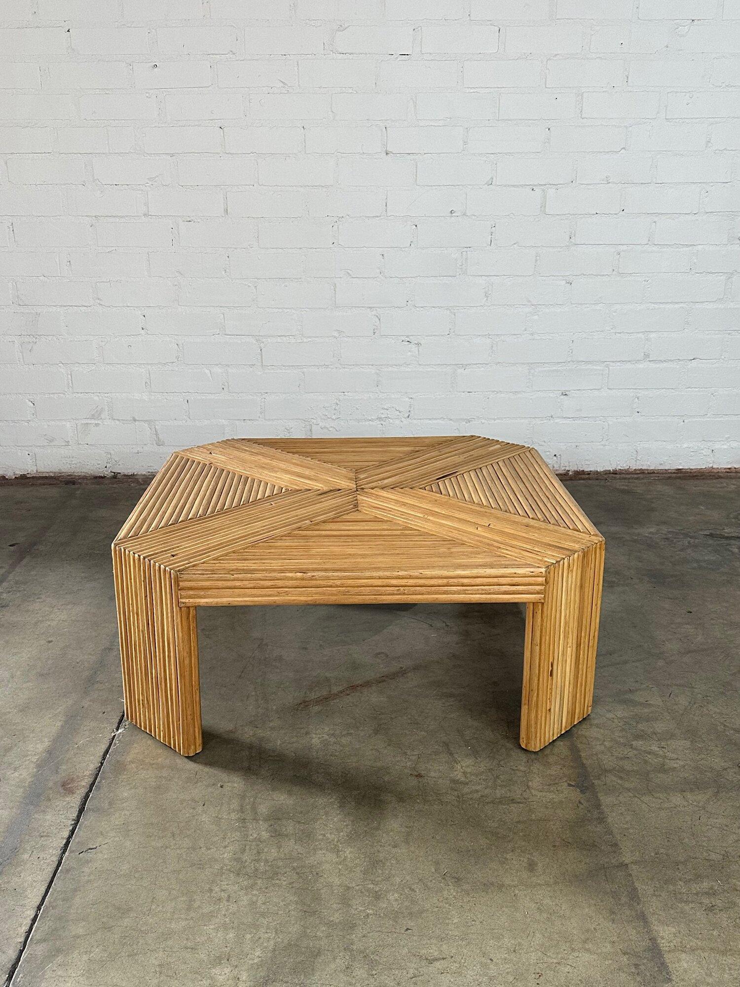 W38 D38 H15

Fully restored pencil reed coffee table has been reinforced and secured for sound structural stability. Item has also been washed and resealed. Item shows in overall great condtion.