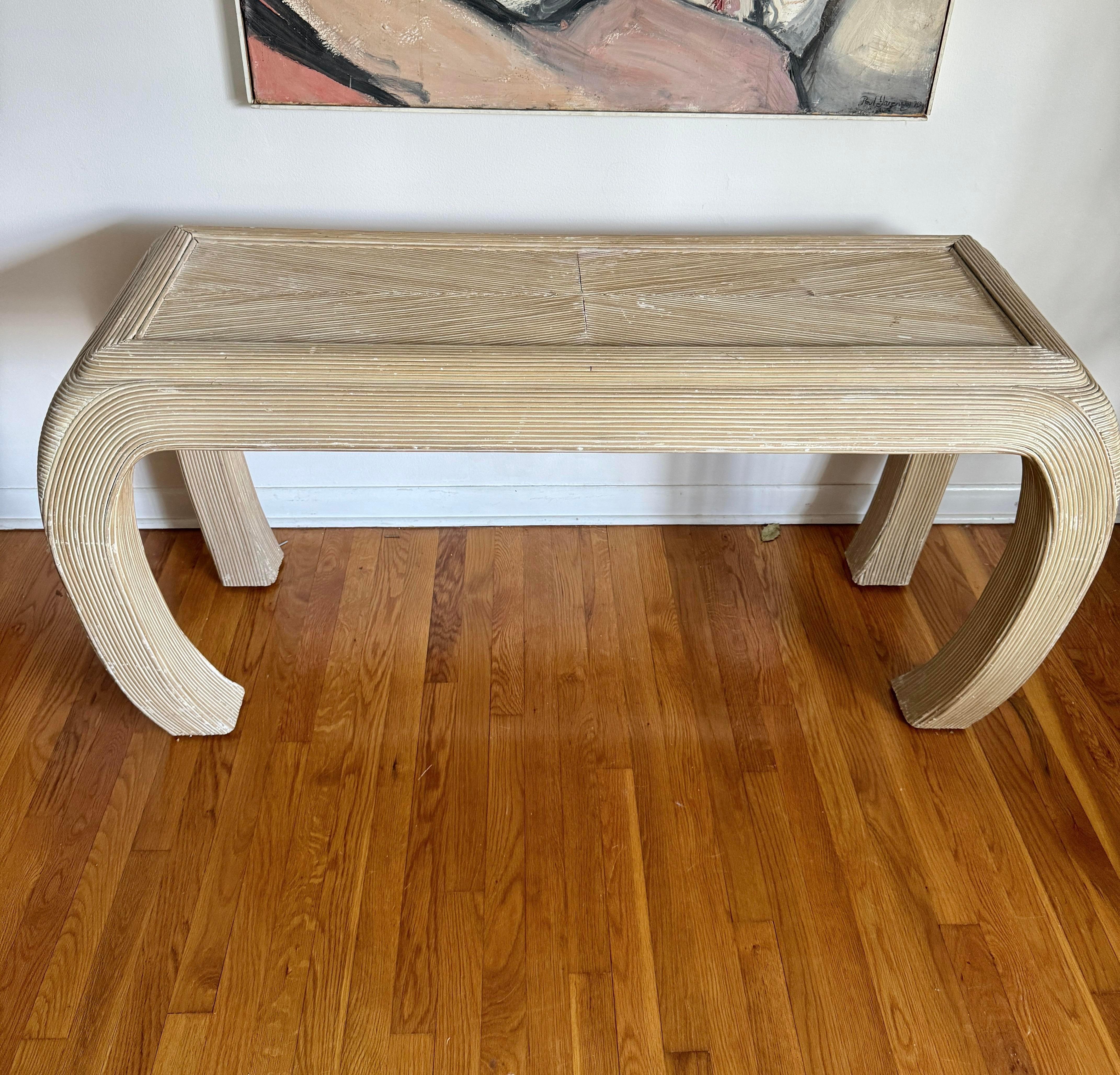 1980s vintage pencil reed entry or sofa table in the style of Karl Springer.
