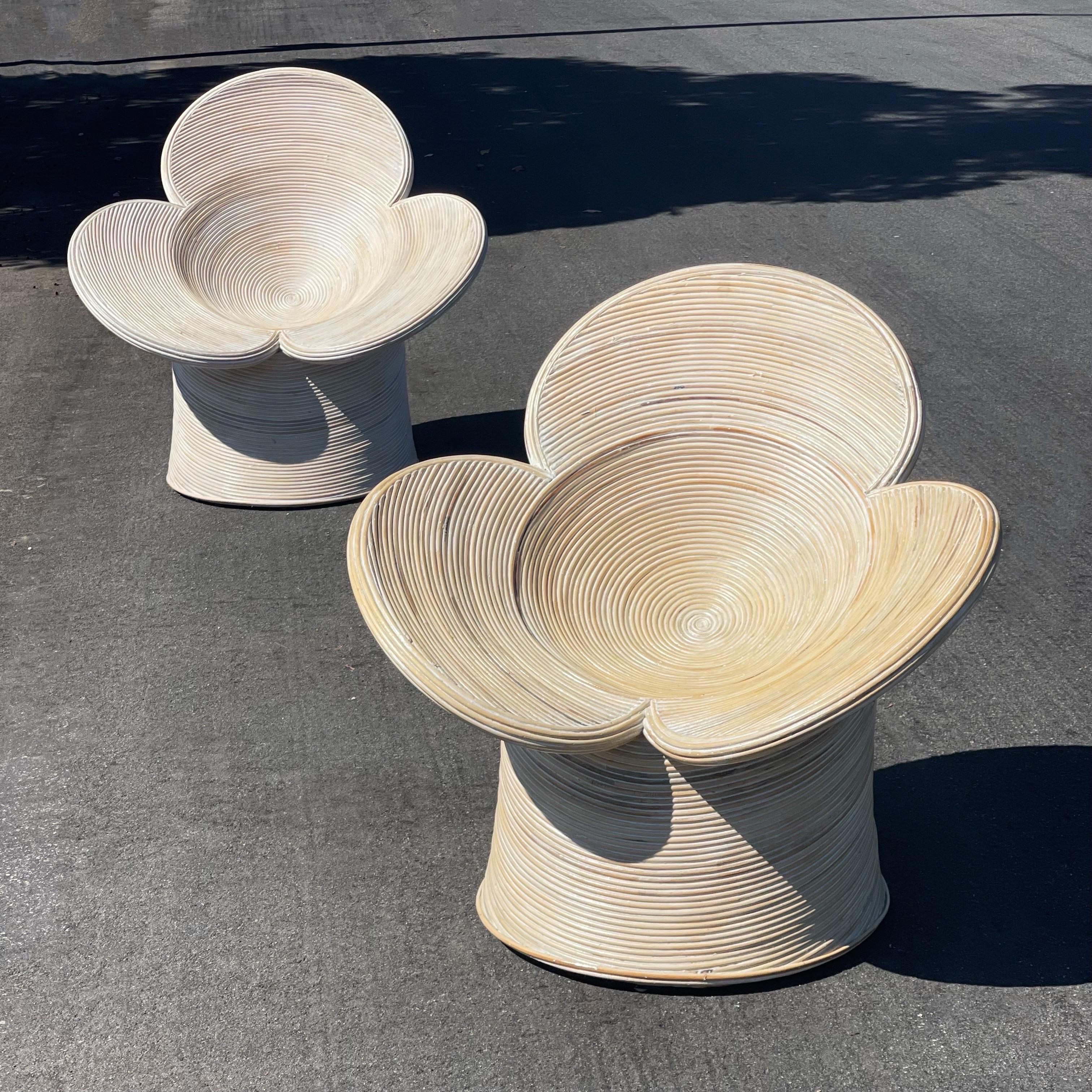 Beautiful set of vintage Pencil Reed chairs, designed in the shape of a flower. In beautiful condition, definitely a conversation starter and totally unique. Neutral tones to compliment any decor. 

