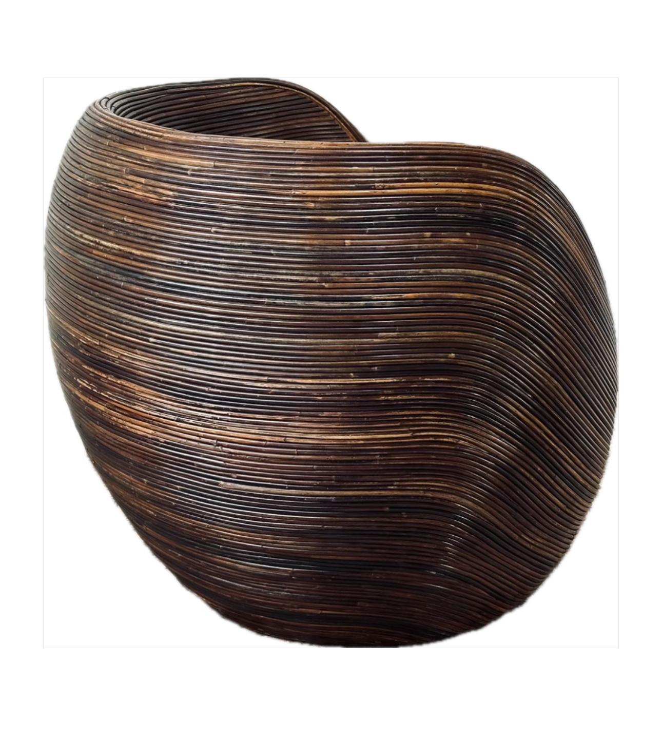 Created in the style of Italian manufacturer ‘Vivai Del Sud’, creating a dense texture of Pencil Reed Bamboo.
Timeless and captivating, this chair instantly elevates in any space.
 Brothers Giorgio and Piero di Pierro founded Vivai del Sud in 1950,