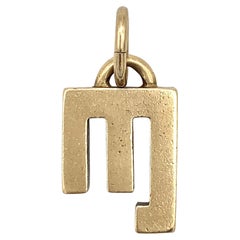 Ciondolo vintage EJ LTD per Gucci in oro 9ct