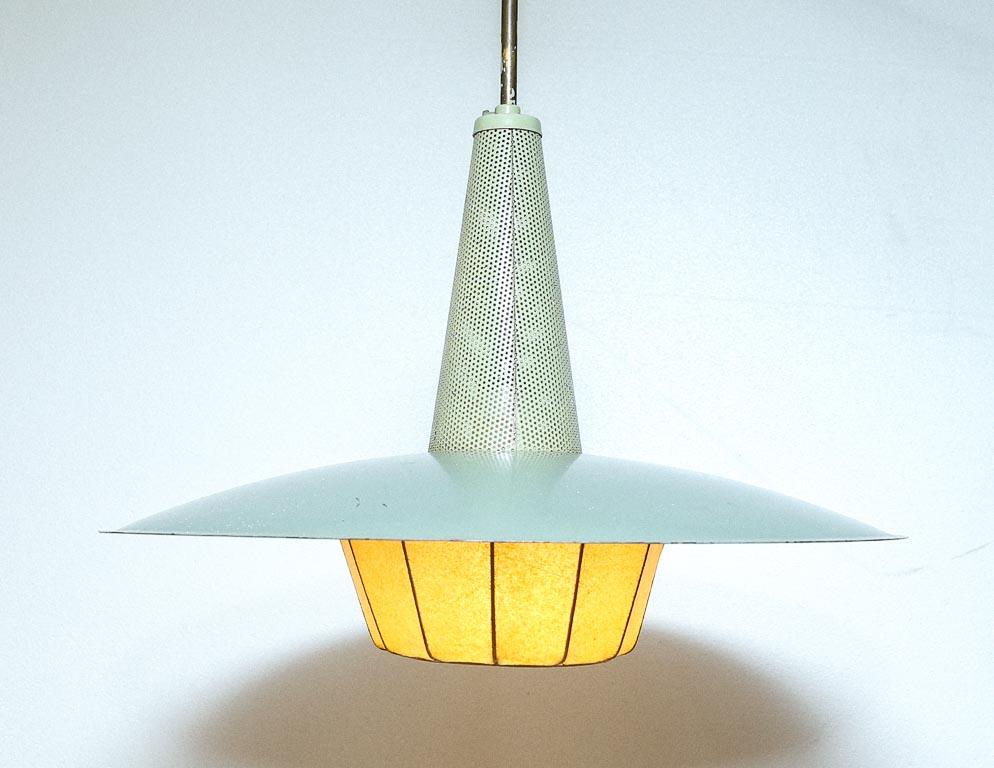 Vintage pendant lamp designed by Louis Kalff for Philips, Holland. Overpainted sage green shade with stretched leather 'cocoon' diffuser. Includes original ceiling cap.

This lamp is currently set up for hard-wiring. We offer a service to add