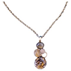 Collana con ciondolo vintage e pietre semipreziose multiple