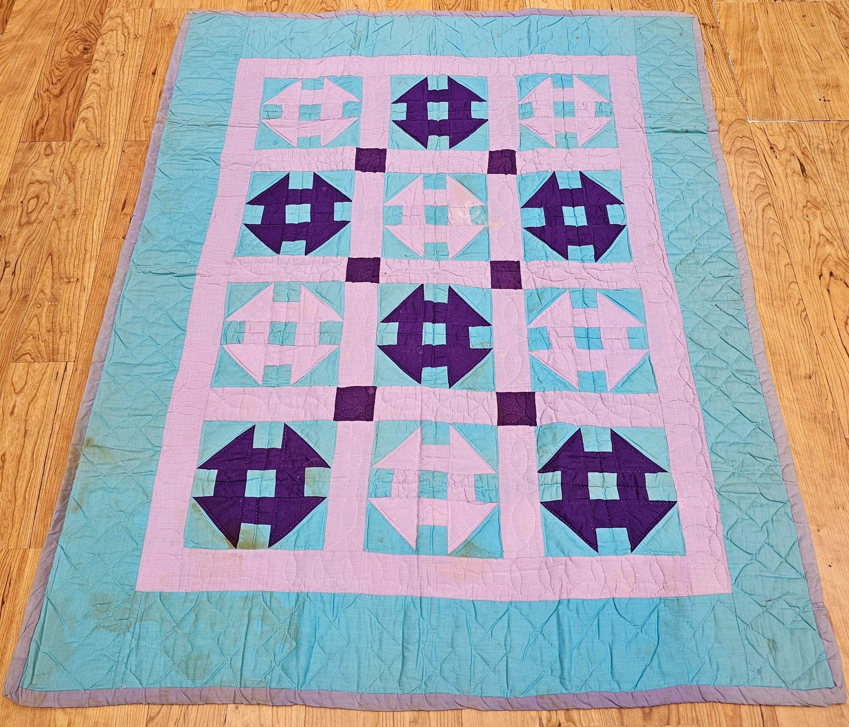 This beautifully hand-crafted Amish quilt, made in Lancaster County, Pennsylvania circa the mid-1900s, features the classic “Churn Dash” pattern—a beloved motif in American quiltmaking, symbolizing home, work, and tradition. Rendered in a joyful