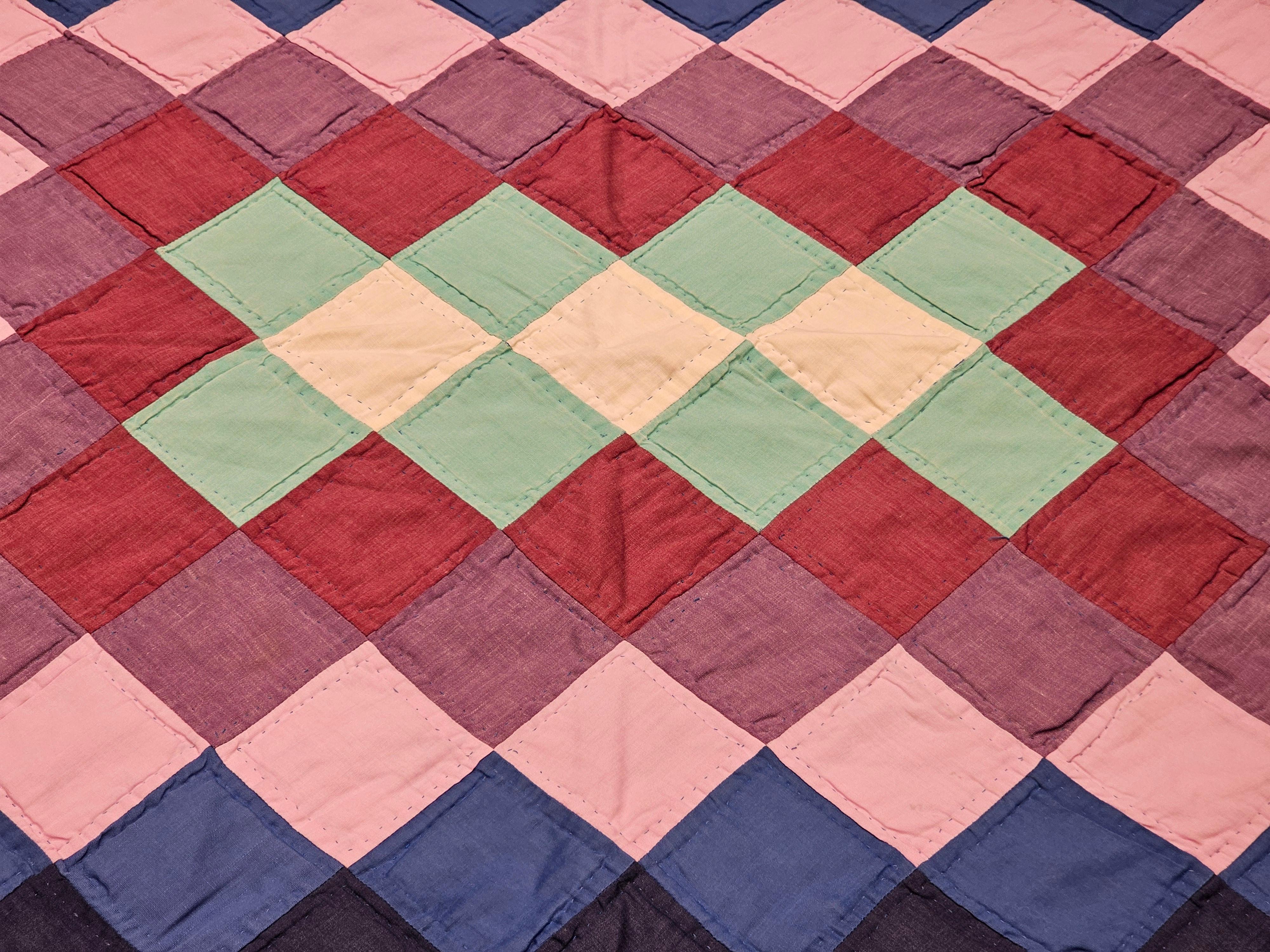 Vintage Pennsylvania Amish “Sunshine and Shadows” Hand-Stitched Crib Quilt In Good Condition For Sale In Barrington, IL