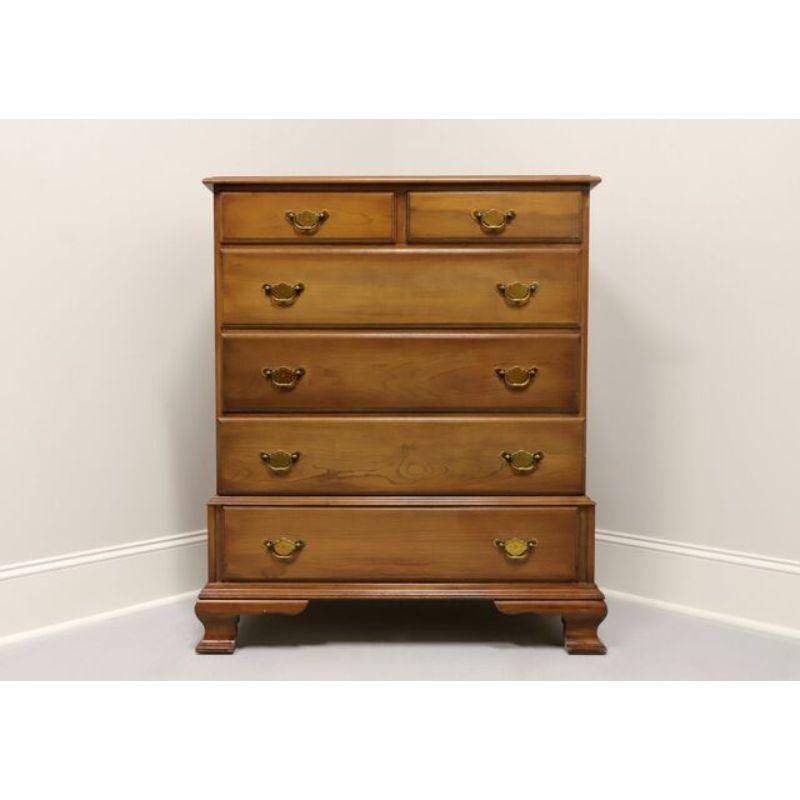 A unique vintage Chippendale style chest on chest by Lewisburg Chair & Furniture, the predecessor to Pennsylvania House Furniture. Solid cherry with brass hardware, two smaller over three larger upper drawers with one larger lower drawer, all