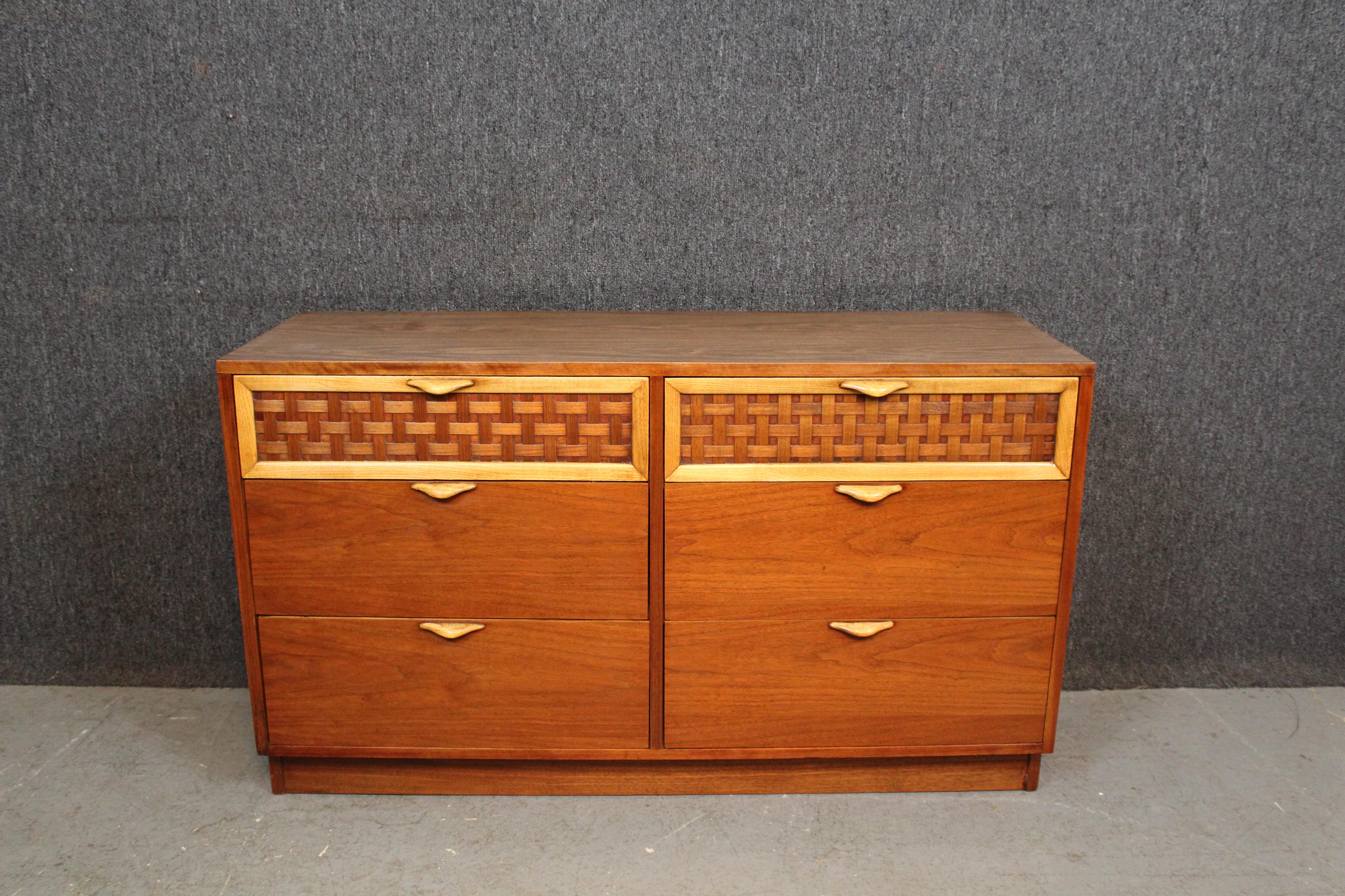 Elevate any space with iconic American Mid-Century Modernism! This unusual dresser from Lane Furniture's renowned 