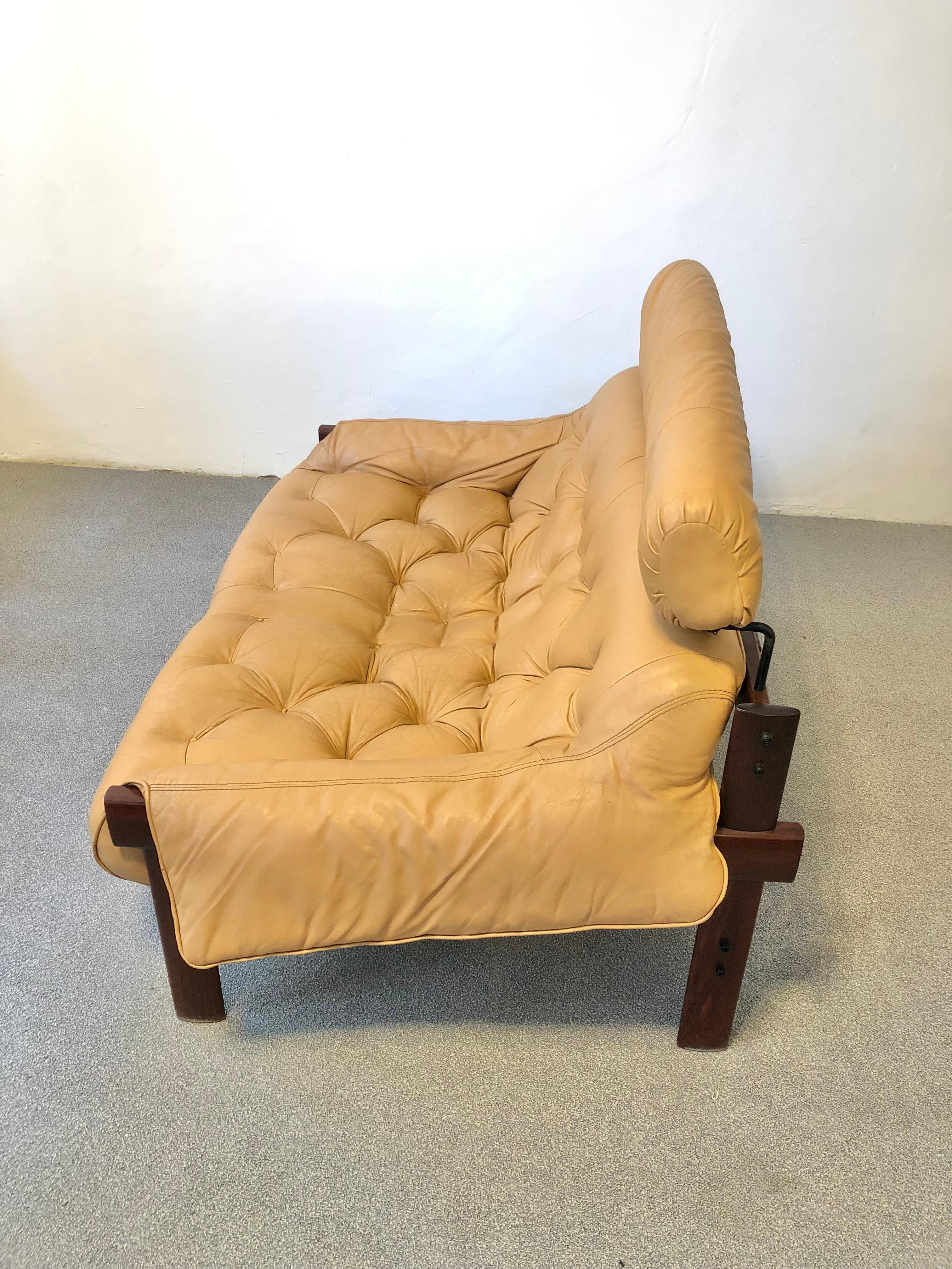 Stunning Loveseat with solid jatobah frame and original leather upholstery, designed by Percival Lafer and manufactured by Lafer Furniture, Brazil, during the 1970s. Light wear and patina consistent with age and use.