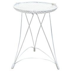 Vintage perforated metal side table by Mathieu Matégot
