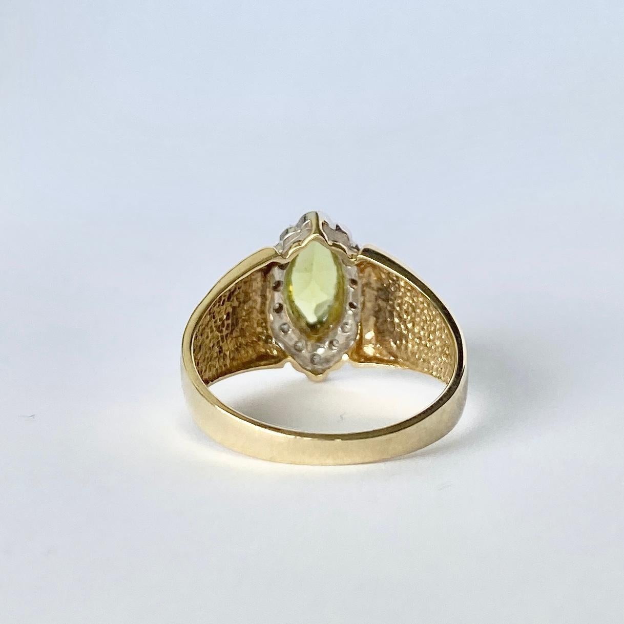 This chunky peridot ring is modelled in 9ct gold. Surrounding the green stone there are Diamond points. The peridot measures approx 75pts and the diamonds total approx 15pts.

Ring Size: R or 8 1/2 
Height Off Finger: 7mm 

Weight: 4g