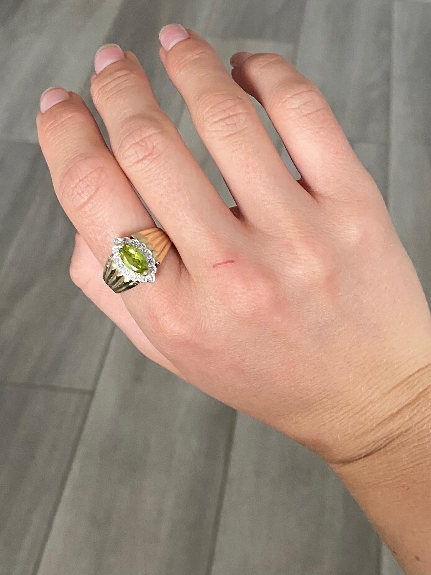 Oval Cut Vintage Peridot and Diamond 9 Carat Gold Three Stone Ring For Sale