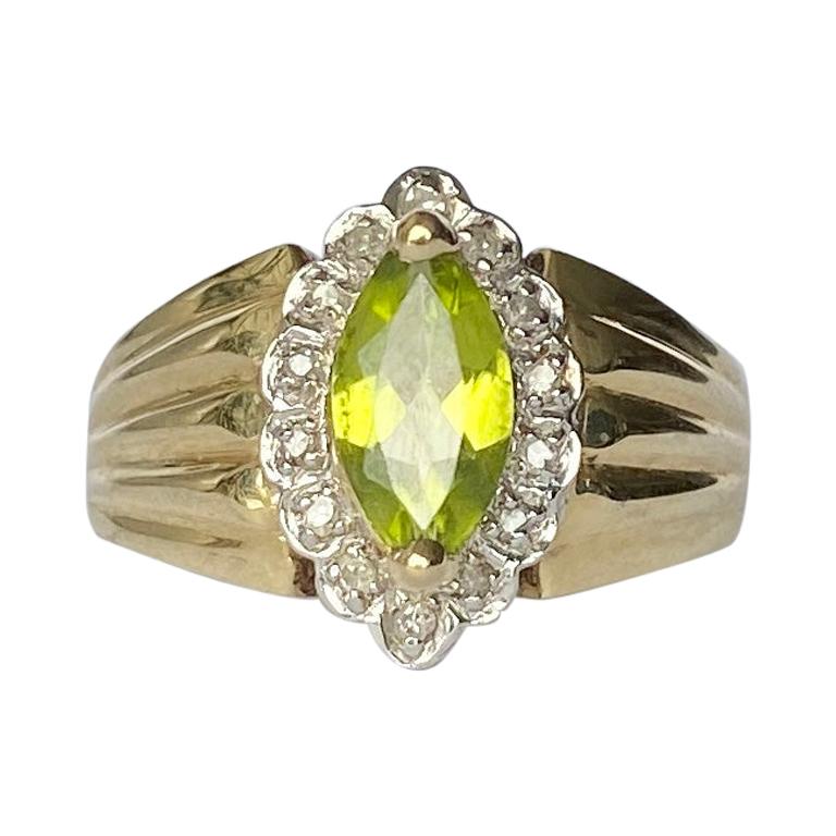 Vintage Peridot and Diamond 9 Carat Gold Three Stone Ring For Sale