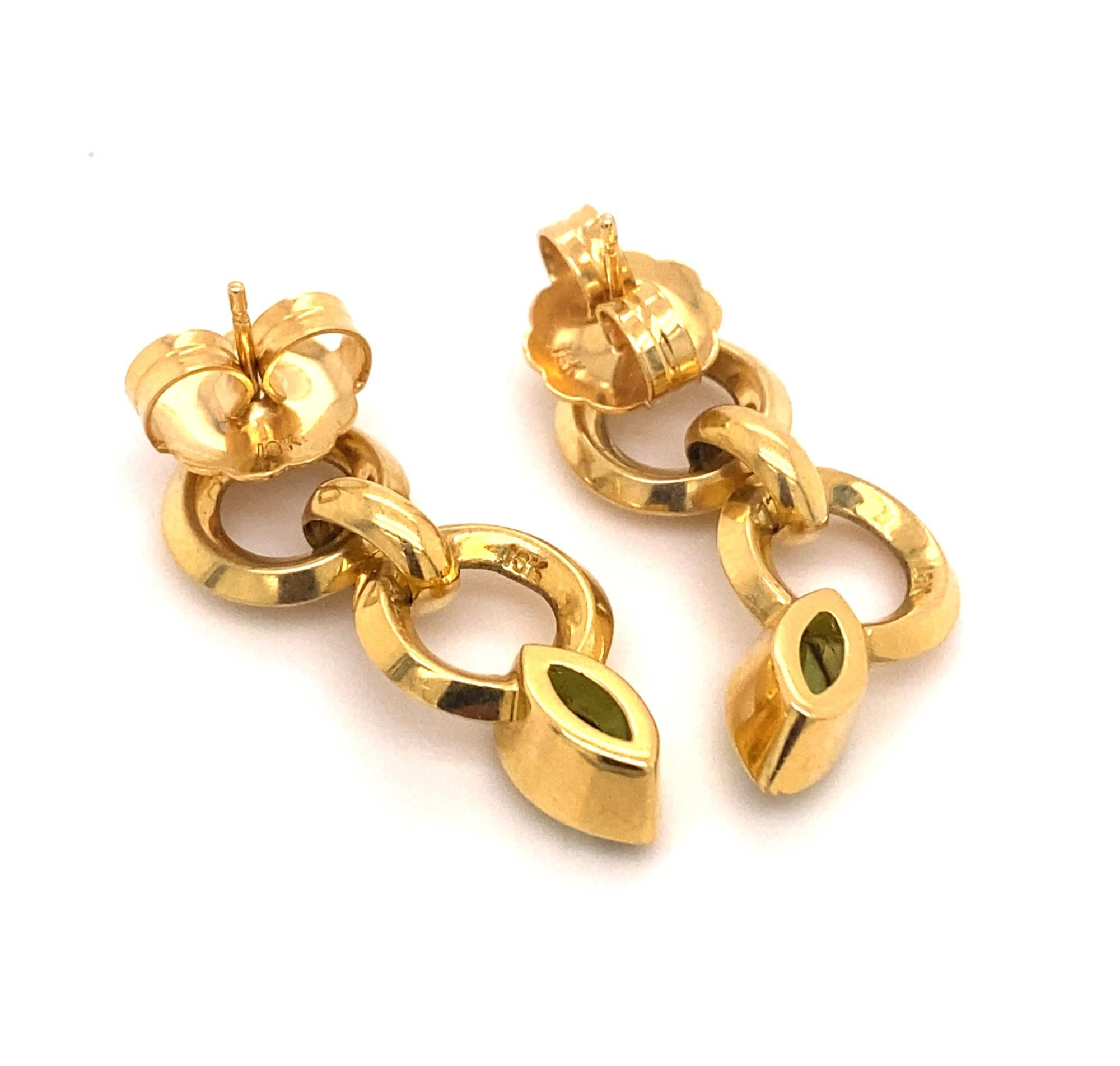 18 Karat Gold Ohrgehänge mit Peridot und Diamanten im Schleifendesign (Marquiseschliff) im Angebot