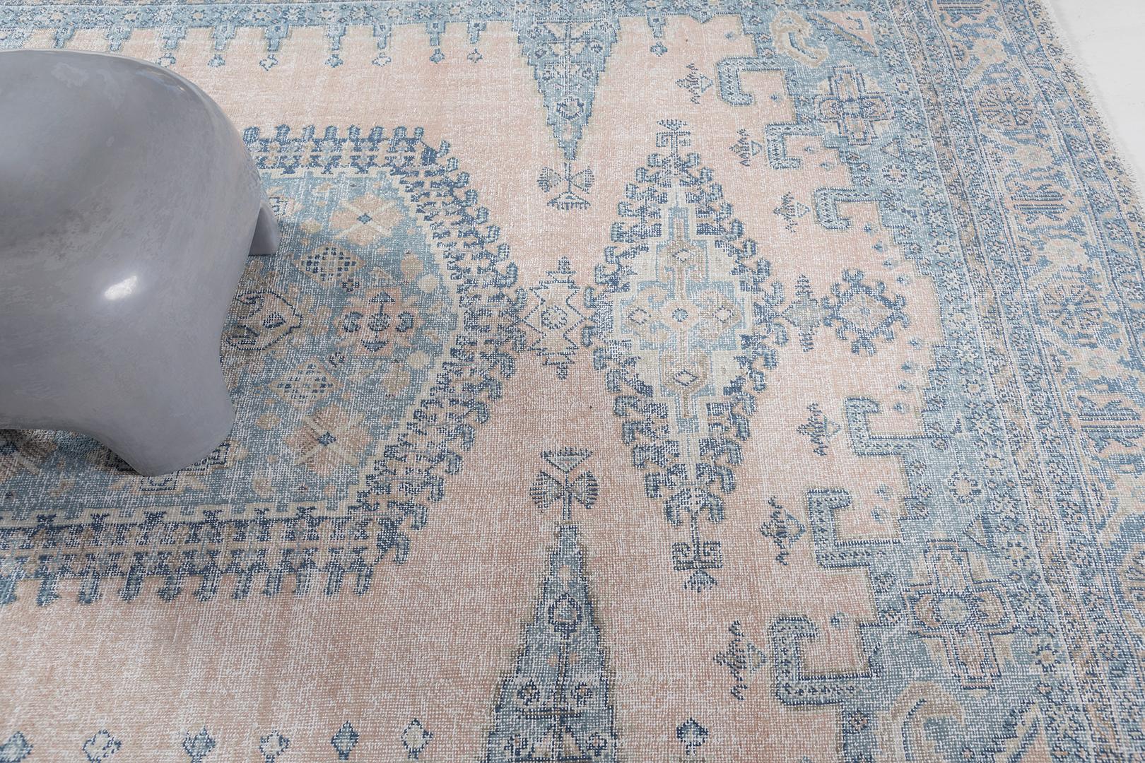 Embellish your room with history and sophistication with our Afshar Vintage Rug. It highlights the diamond and hexagonal framework on its core and is surrounded by Persian symbols. Persian rugs are one of the finest rugs of Mehraban's collection,