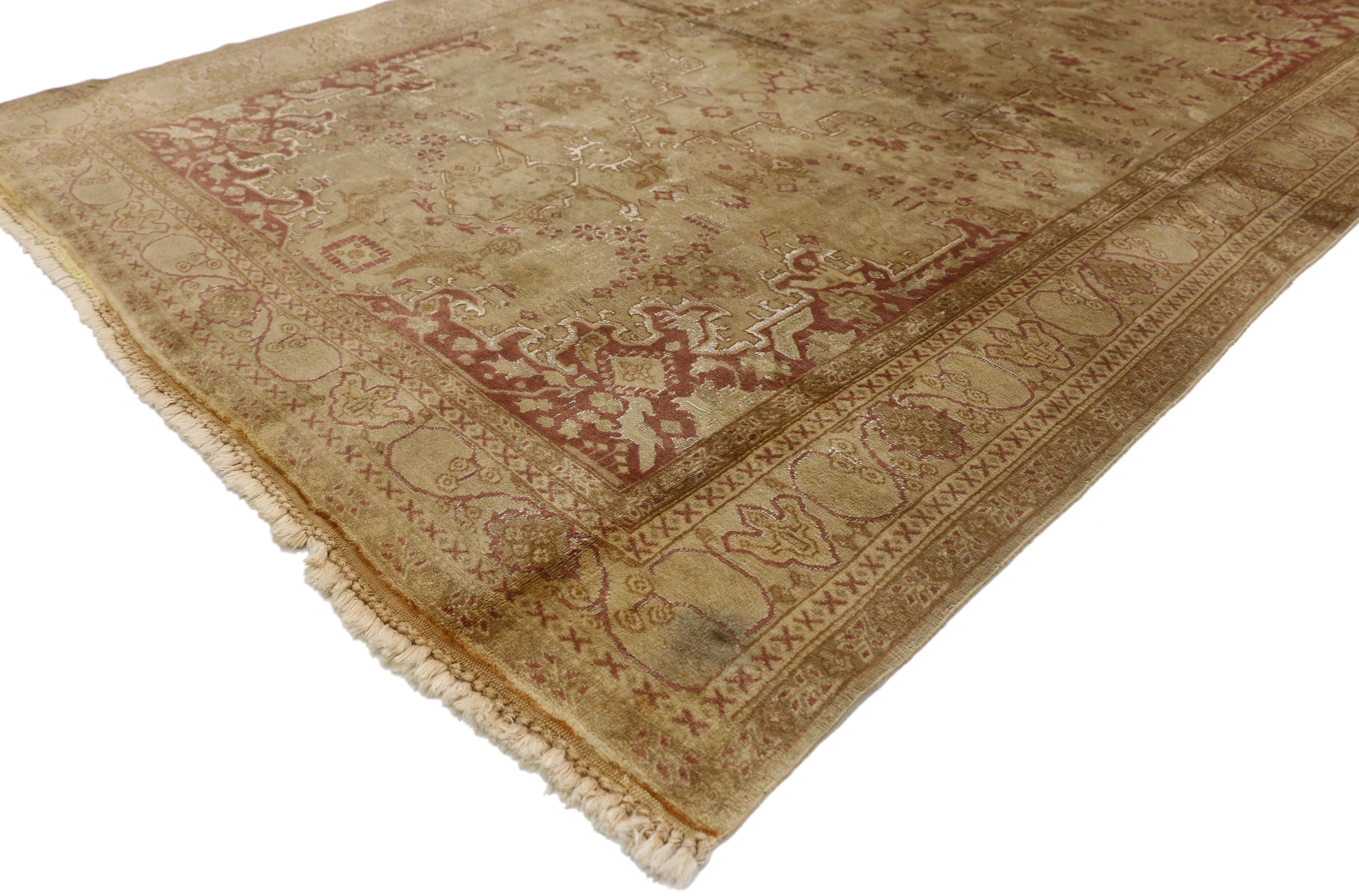 71930 Vintage Persian Ardabil Rug with Rustic Artisan Shabby Chic Style. This hand-knotted wool vintage Persian Ardabil rug features an inconspicuous centre medallion floating in an an abrashed field surrounded by geometric motifs while rustic mauve