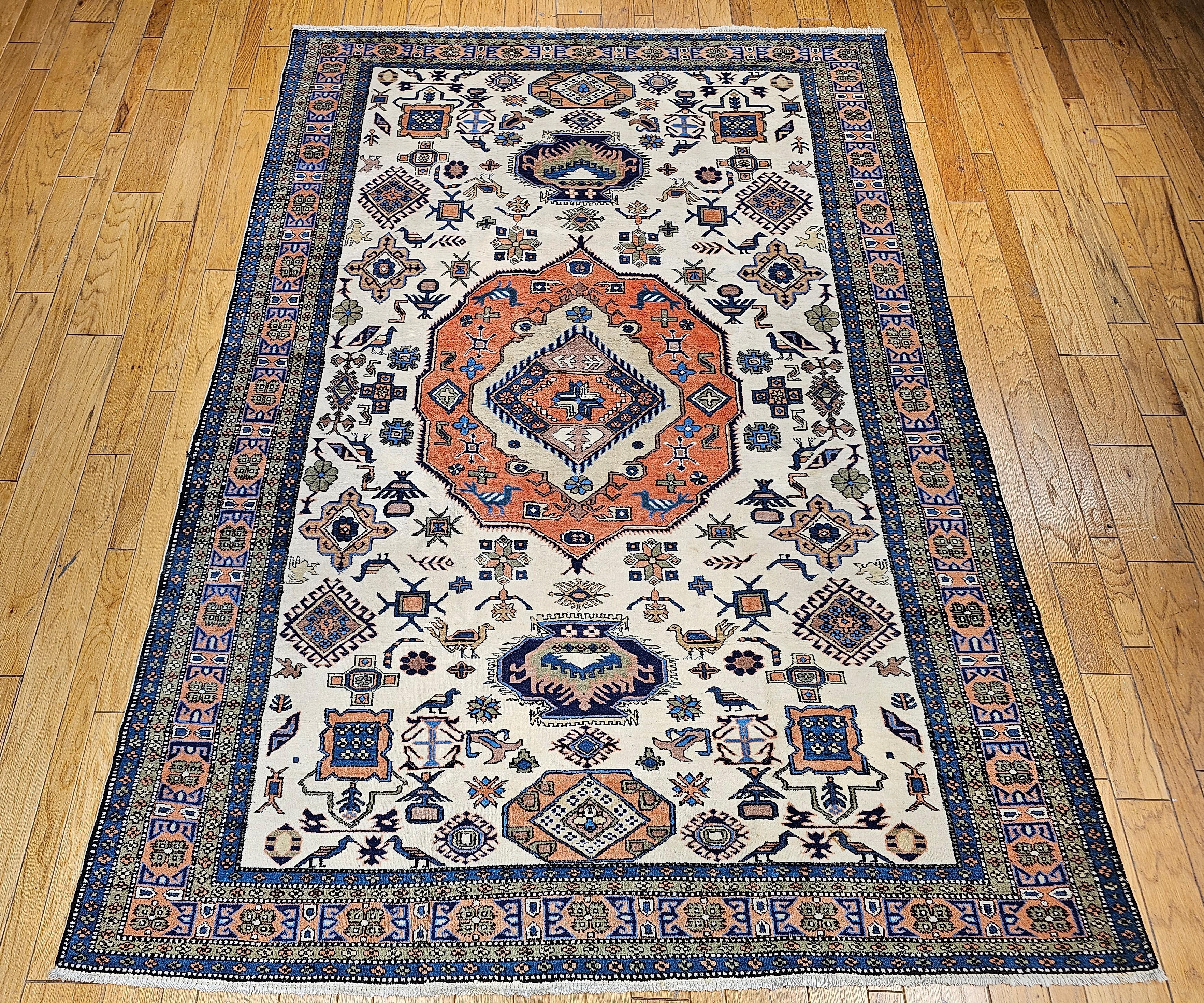 Vintage Persian Ardebil room size carpet from the mid 1900s with a “signature Ardebil” geometric design..   The ancient city of Ardebil is located on Northeast of the Azerbaijan province on the west side of the Caspian Sea and South of the Caucasus