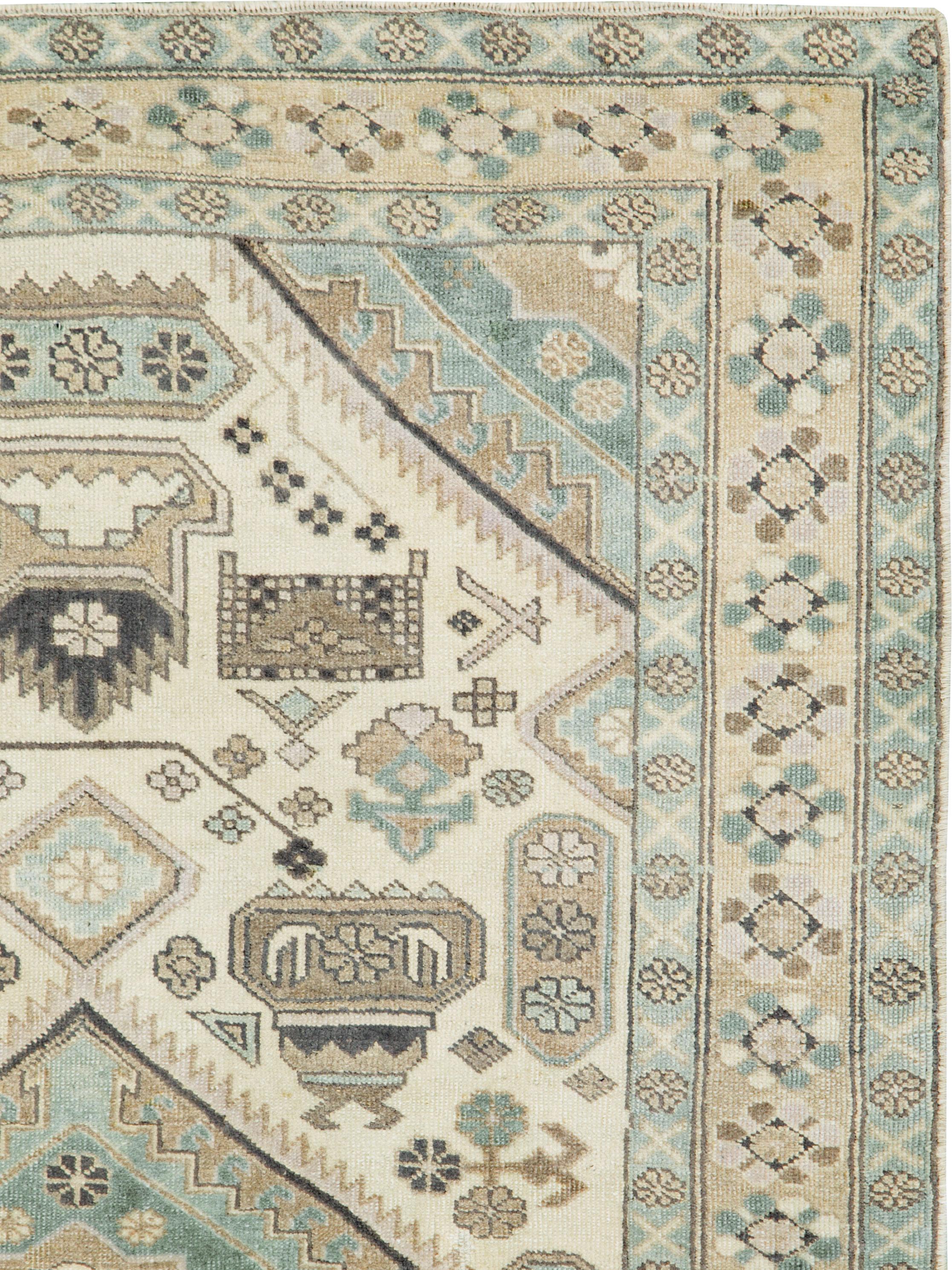 A vintage Persian Ardebil rug from the mid-20th century.
