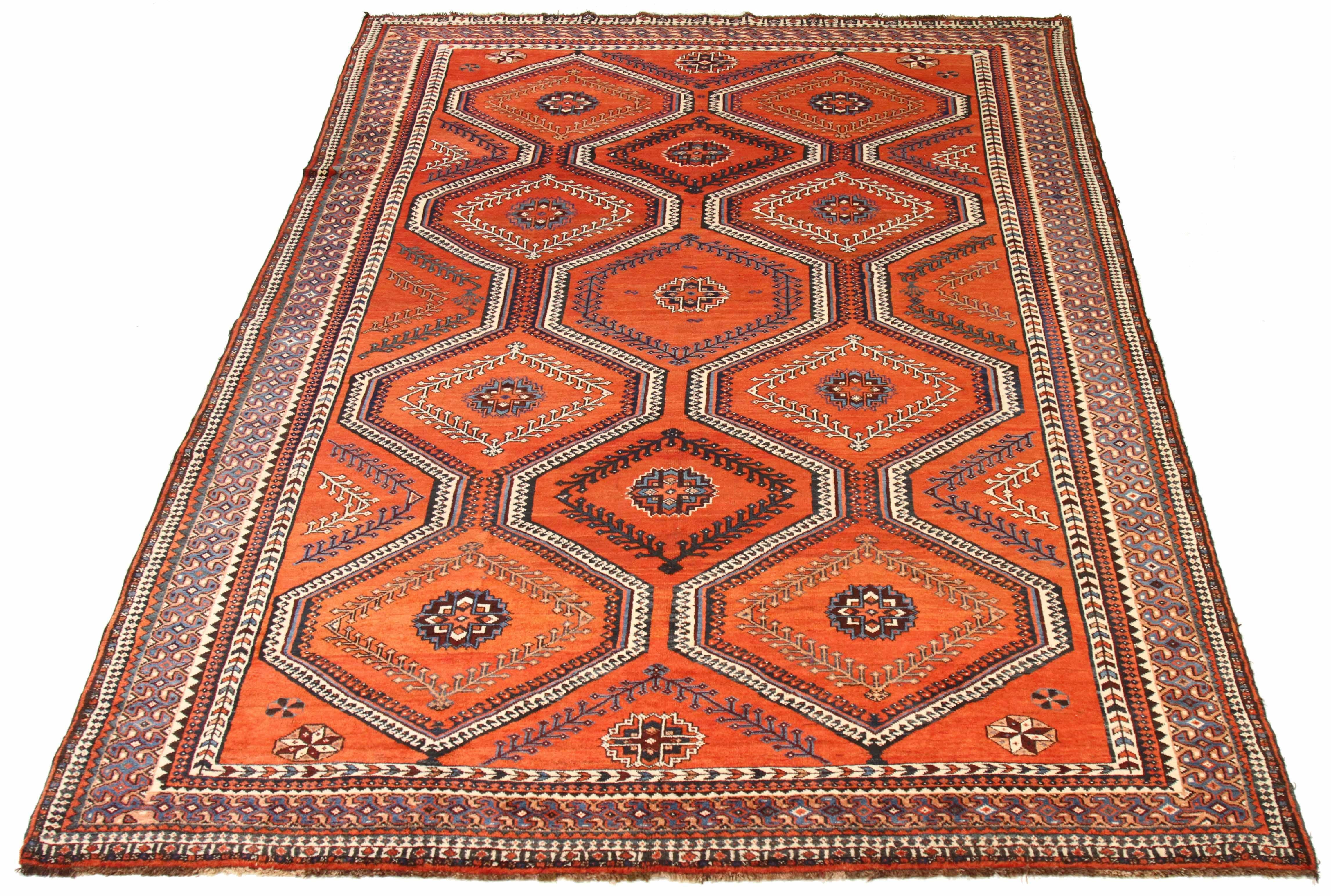 Vintage Persian area rug handwoven from the finest sheep’s wool. It’s colored with all-natural vegetable dyes that are safe for humans and pets. It’s a traditional Shiraz design handwoven by expert artisans. It’s a lovely area rug that can be