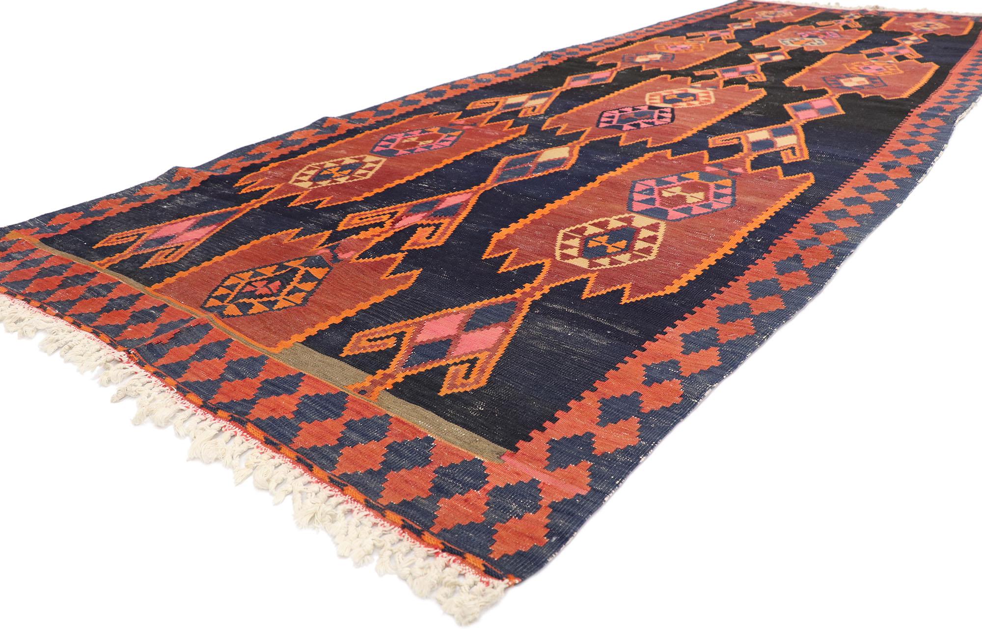 77967 Vintage Persian Azerbaijan Kilim Rug, 04'09 x 13'08. Introducing a masterpiece of textile artistry, this handwoven wool Persian Azerbaijan kilim rug hails from the rich heritage of northwestern Iran. Immerse your space in a bold Southwestern