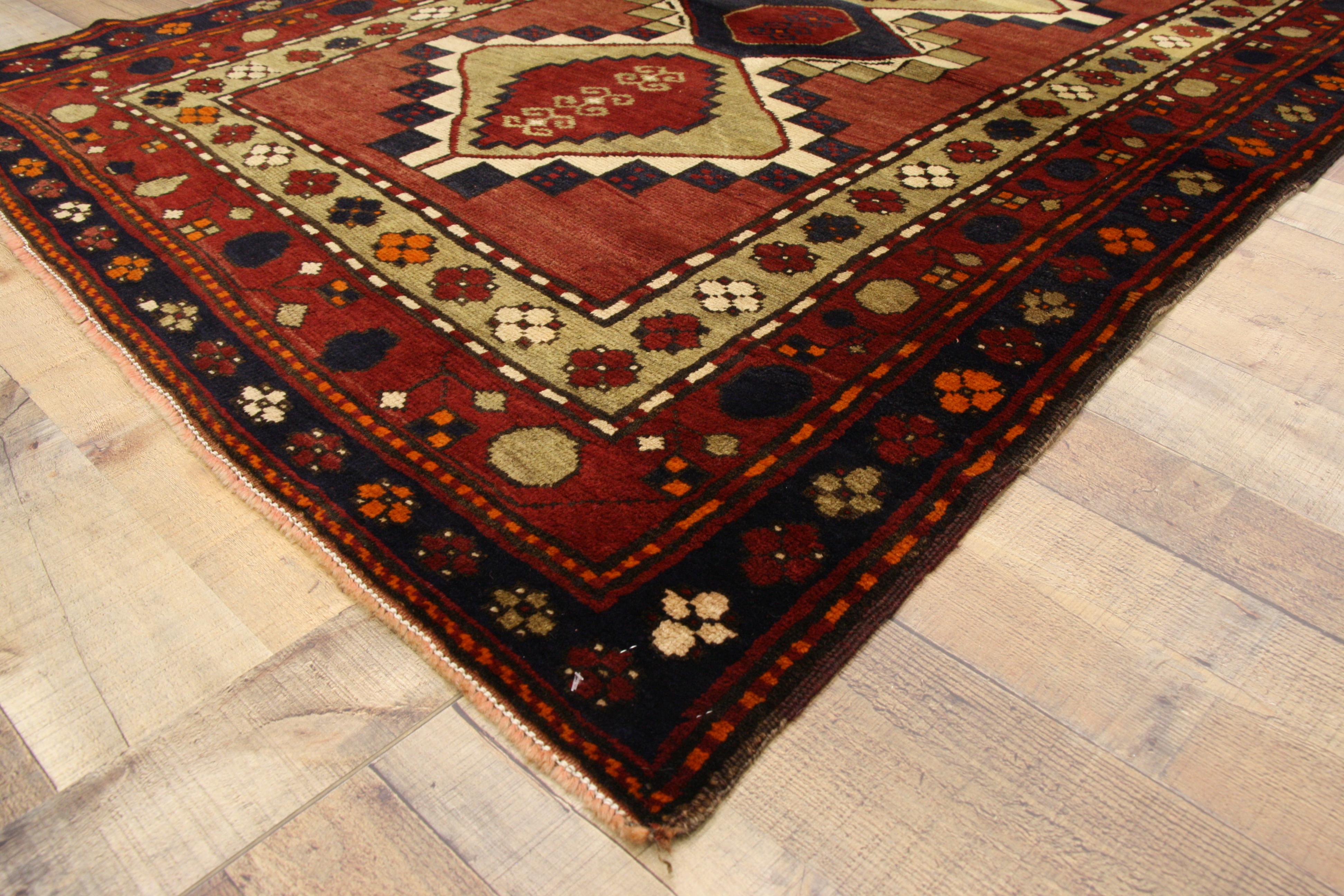 75646, vintage Persian Azerbaijan rug with tribal style. Trending home interiors showcase darker color palettes as the daylight shortens and days get darker. Autumn and Winter interior trends are about introducing warmth, elegance and luxe colors to
