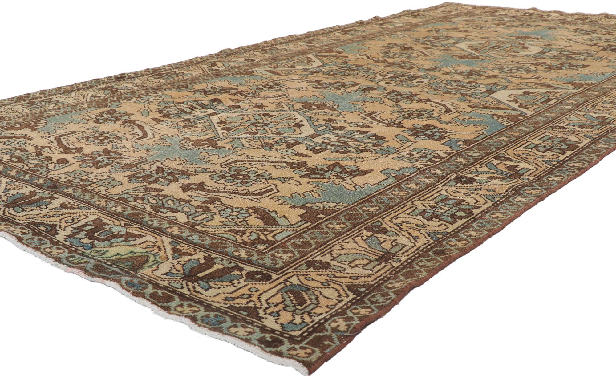 61029 Vintage Persian Bakhtiari Gallery rug 05'02 x 09'11. With its effortless beauty and timeless design, this hand-knotted wool Persian Bakhtiari gallery rug is poised to impress. The abrashed tan colored field features an all-over stylized Herati