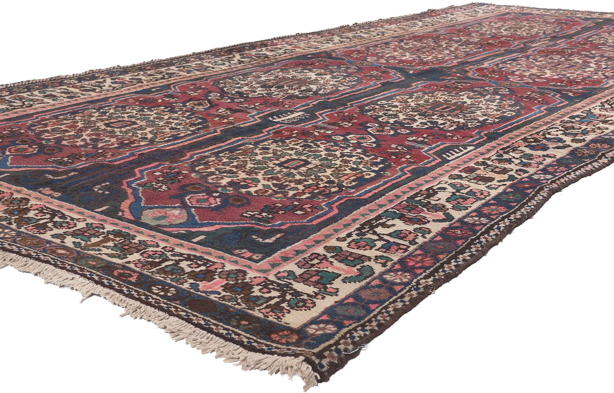 75880 Vintage Persian Bakhtiari Rug, 05'10 X 12'02.
Bungalow charm meets classic sophistication in this vintage Persian Bakhtiari rug. The naturalistic forms and dramatic color palette woven into this piece work together creating an elaborate yet