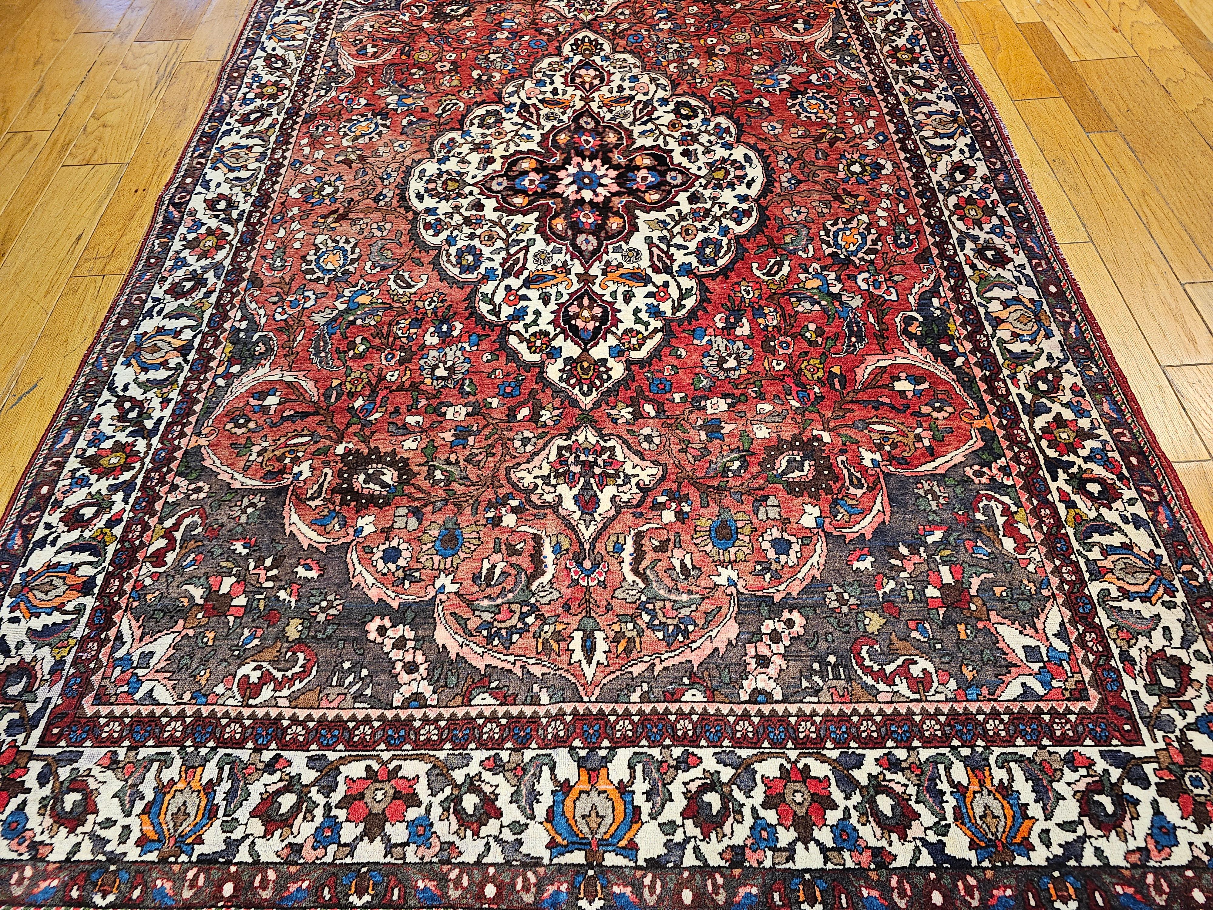 Hand-Woven Vintage Persian Bakhtiari Room Size Rug in Medallion Floral Pattern in Brick Red For Sale