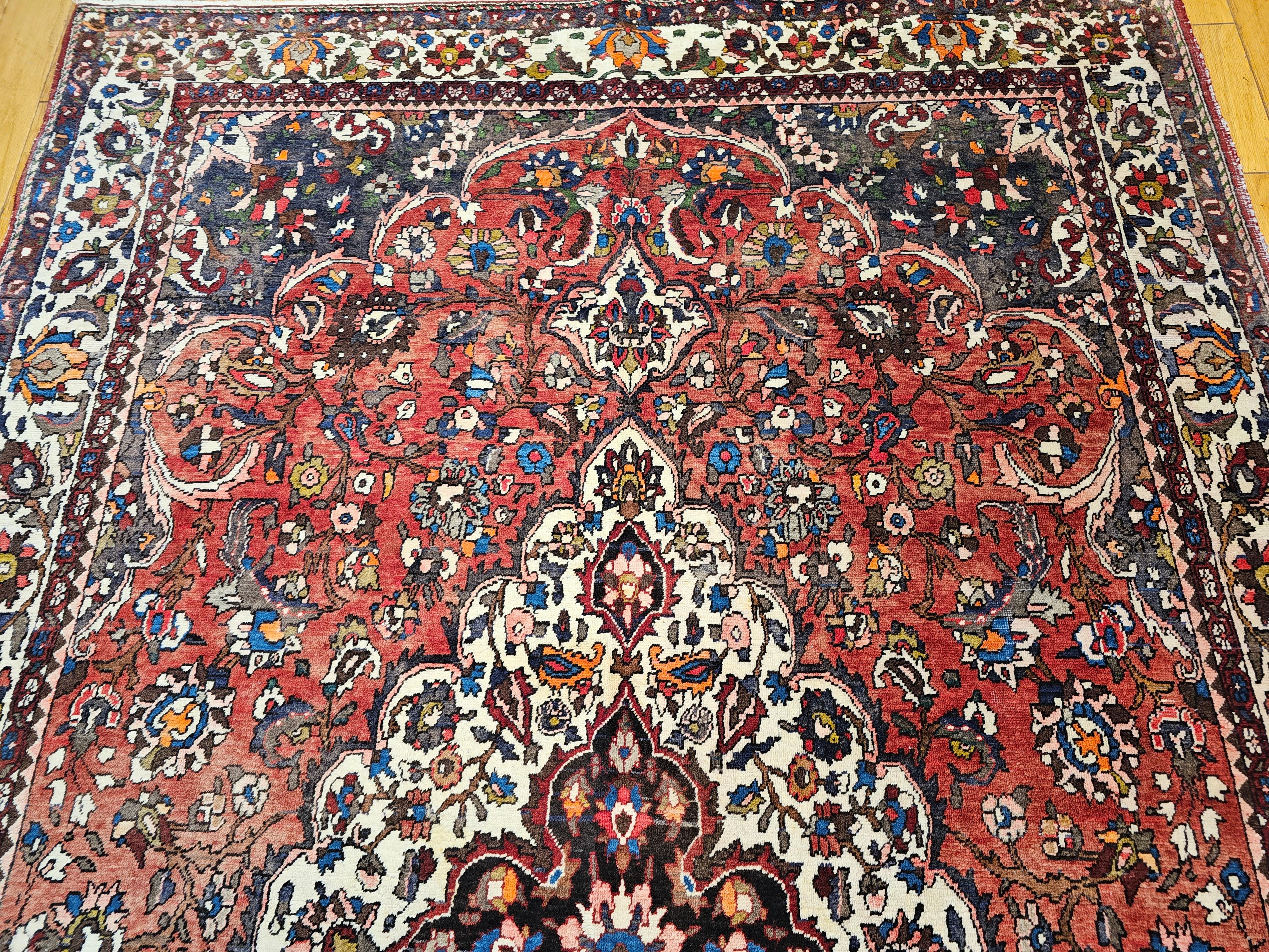 20th Century Vintage Persian Bakhtiari Room Size Rug in Medallion Floral Pattern in Brick Red For Sale
