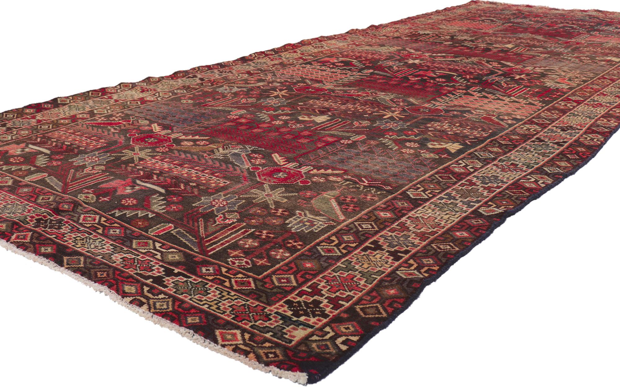 61224 Vintage Persian Bakhtiari rug, 04'11 x 12'07. With its rugged beauty, incredible detail and texture, this hand knotted wool vintage Persian Bakhtiari rug is a captivating vision of woven beauty. The geometric design and lively colorway woven