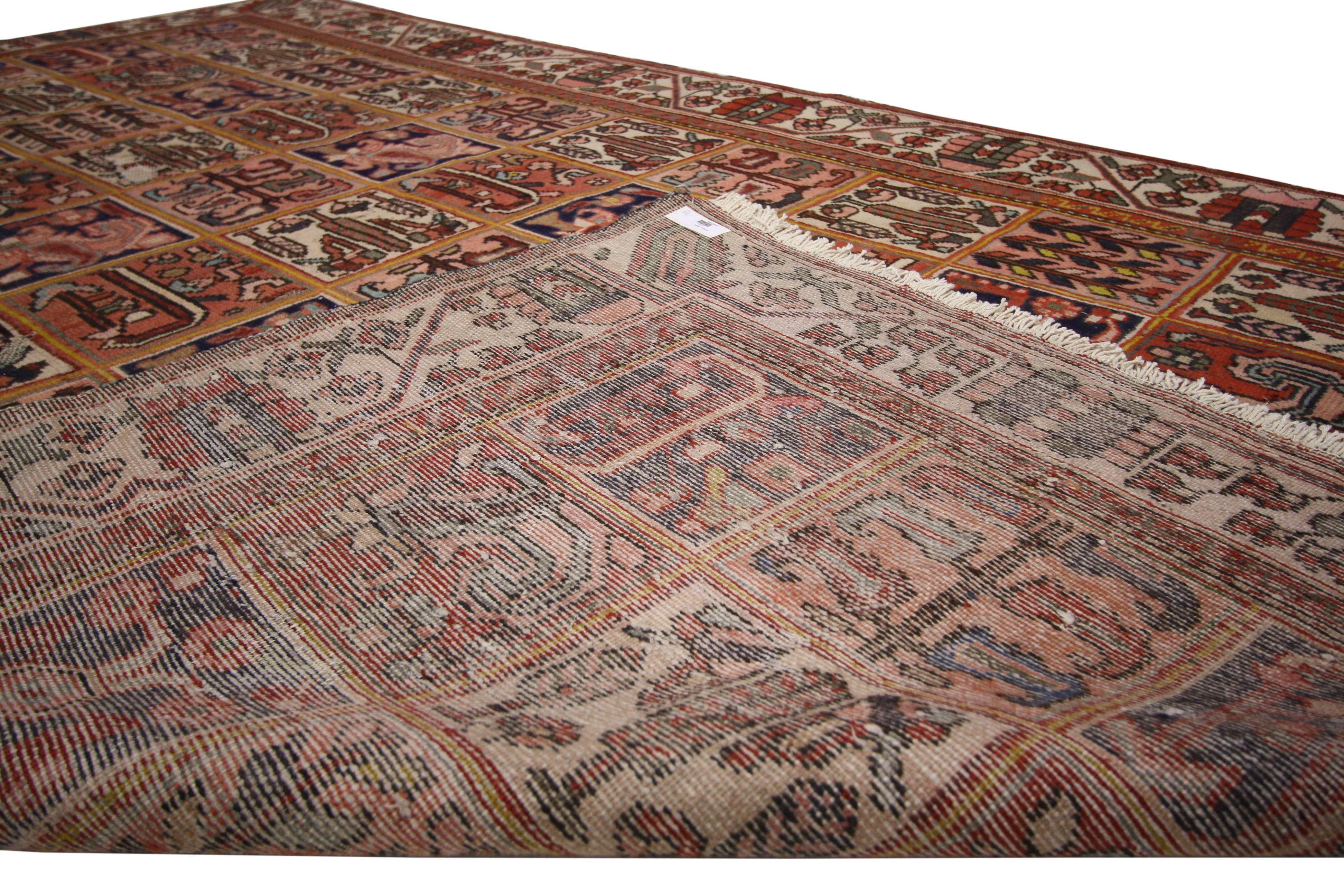 74579, vintage Persian Bakhtiari rug with Four Seasons garden design. This hand-knotted wool vintage Persian Bakhtiari rug features the Four Seasons design with a traditional modern style. Classically composed and boasting a truly magnificent Four
