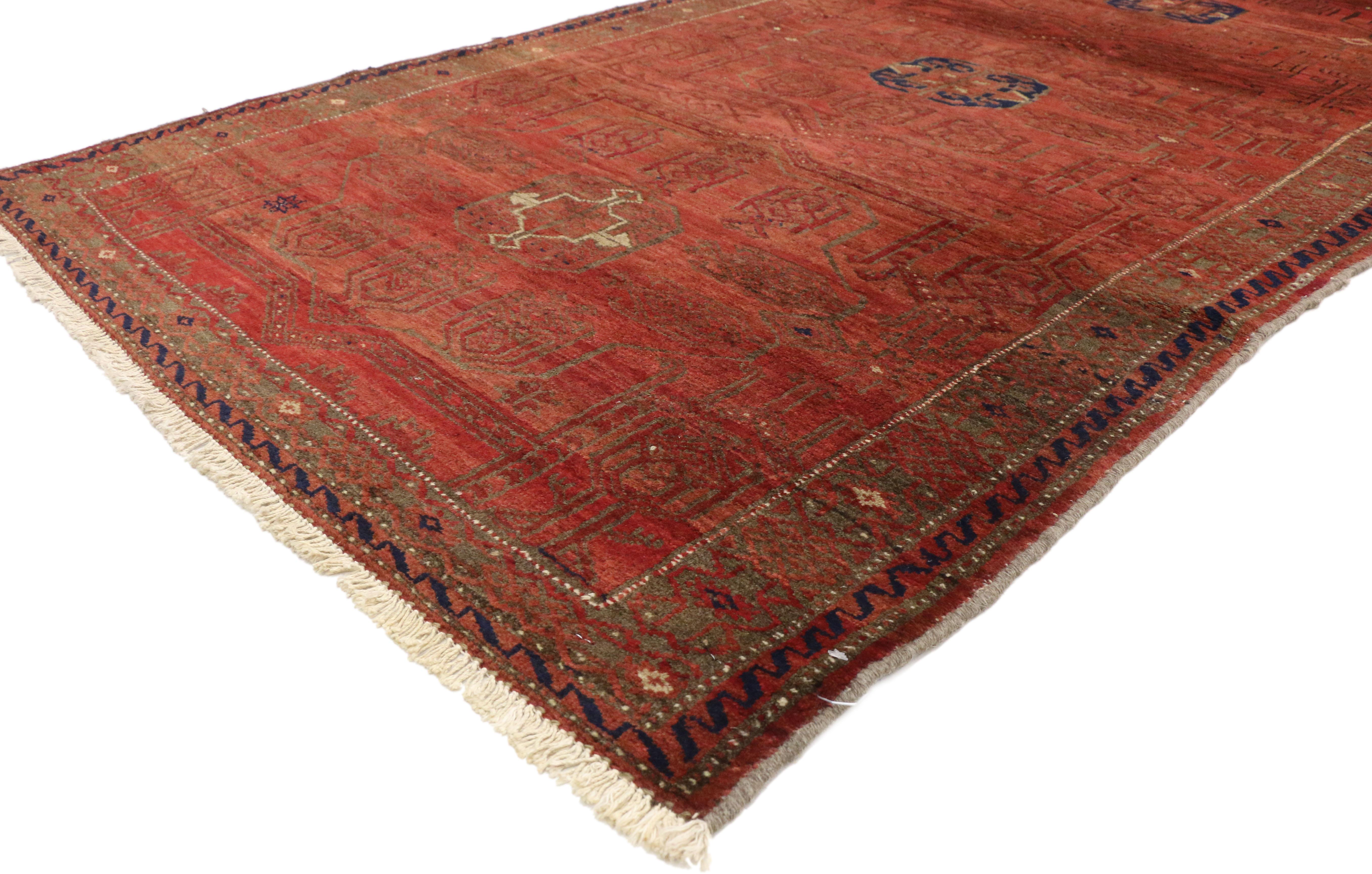76495, vintage Persian Baluch hallway runner with Mid-Century Modern Tribal style. This hand knotted wool vintage Persian Baluch hallway runner features a large-scale pattern of four inconspicuous octofoil amulets filled with and surrounded by