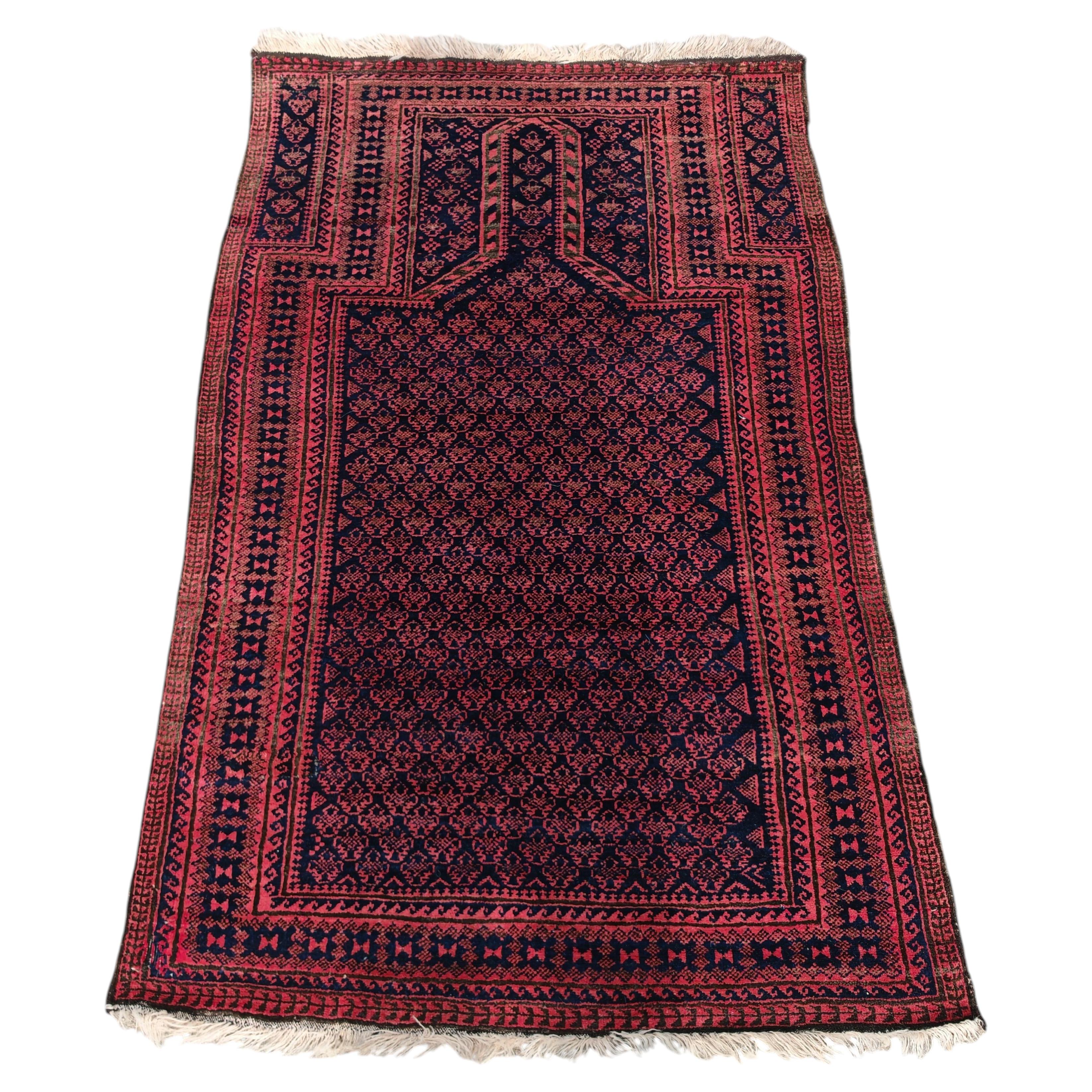 Vintage Persian Baluch prayer rug in natural dyed wool, Afghanistan 1950s