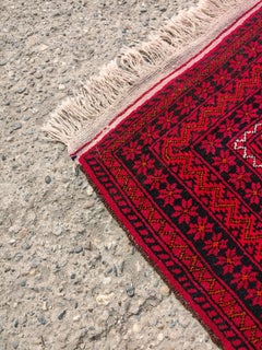 Vintage Persian Baluch Rug, hand-knitted in natural dyed wool, Afghanistan 1970s