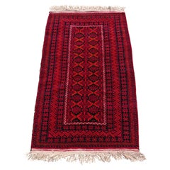 Vintage Persian Baluch Rug, hand-knitted in natural dyed wool, Afghanistan 1970s