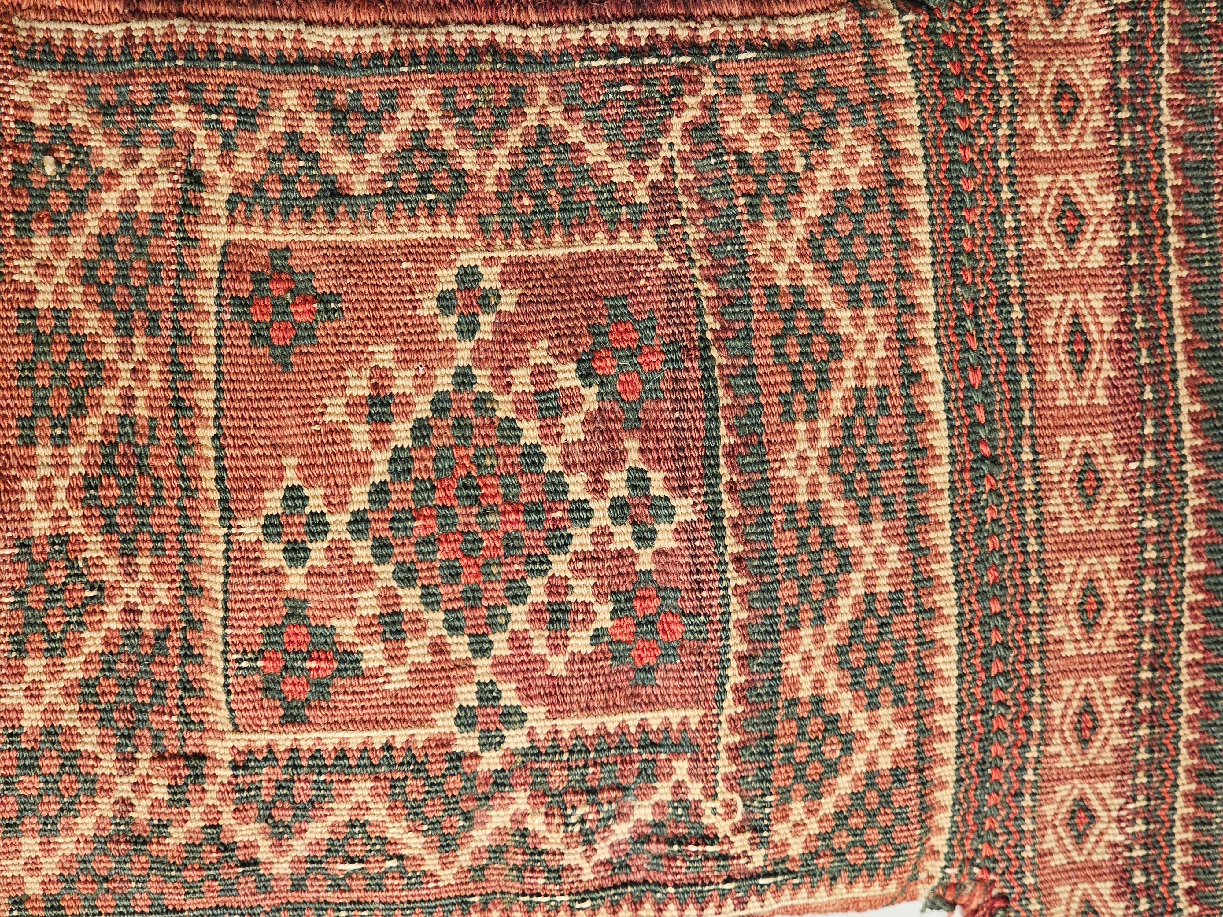 Vegetable Dyed Vintage Persian Baluch Salt Bag in green, red, Ivory, Brown as Tribal Wall Art For Sale