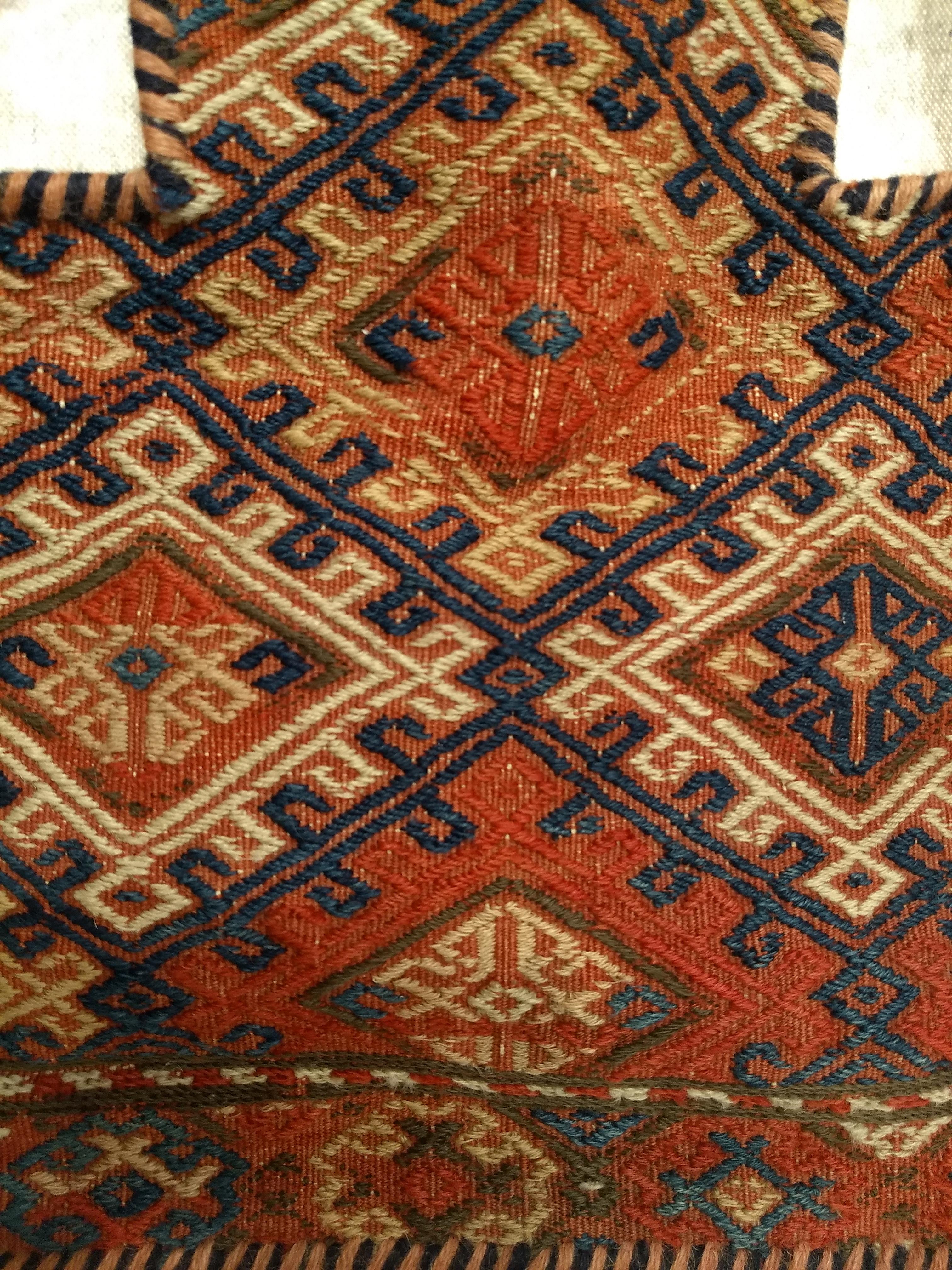 Vegetable Dyed Vintage Persian Baluch Soumak Salt Bag in Red, Blue, Brown as Tribal Wall Art For Sale