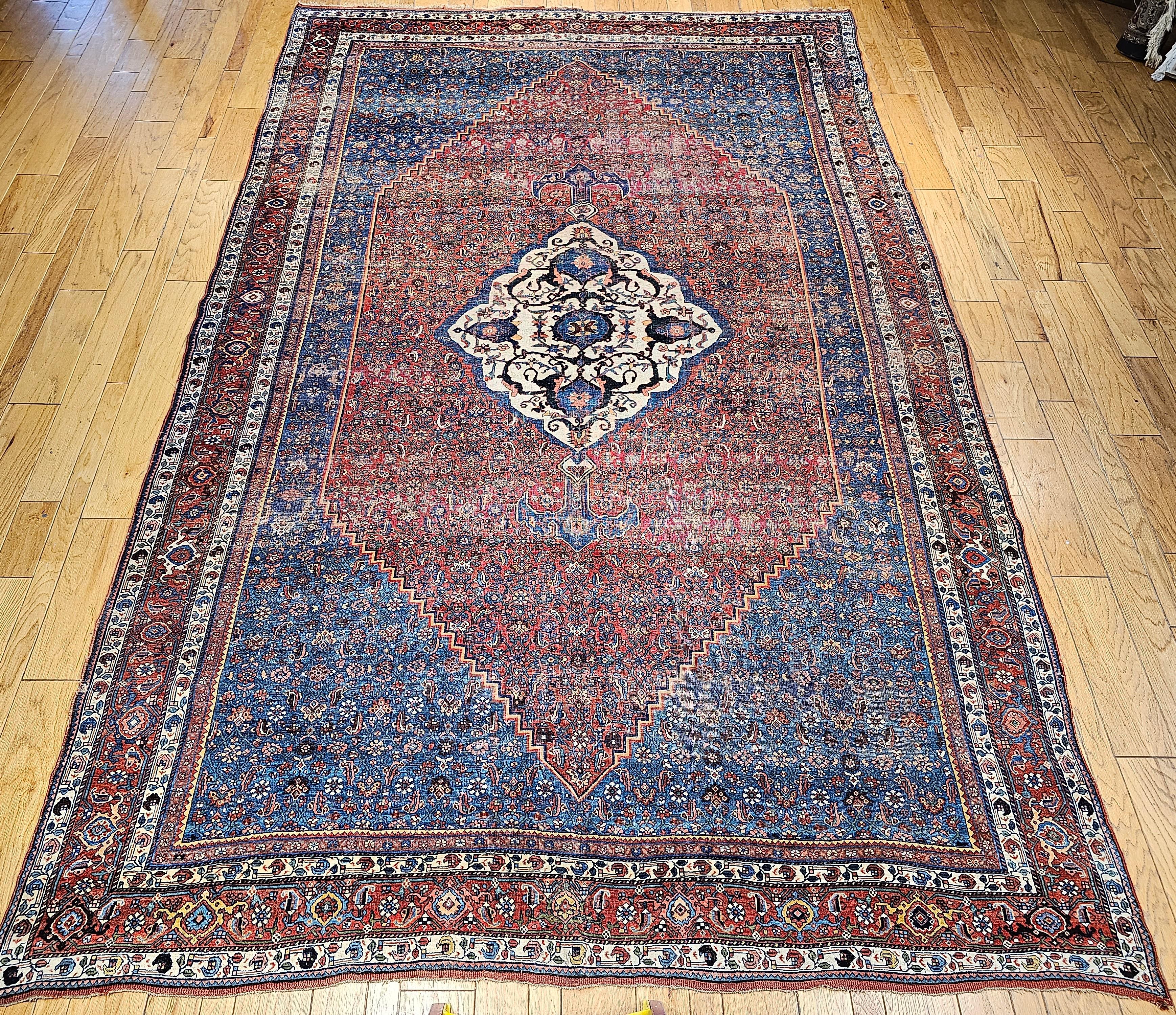 Beautiful oversized Persian Bidjar  rug is a great example of the art of Persian rug weaving from the last quarter of the 1800s. The Bidjar (Bijar) rug is a very unique and extremely desirable “Herati pattern” field in an abrash antique French blue