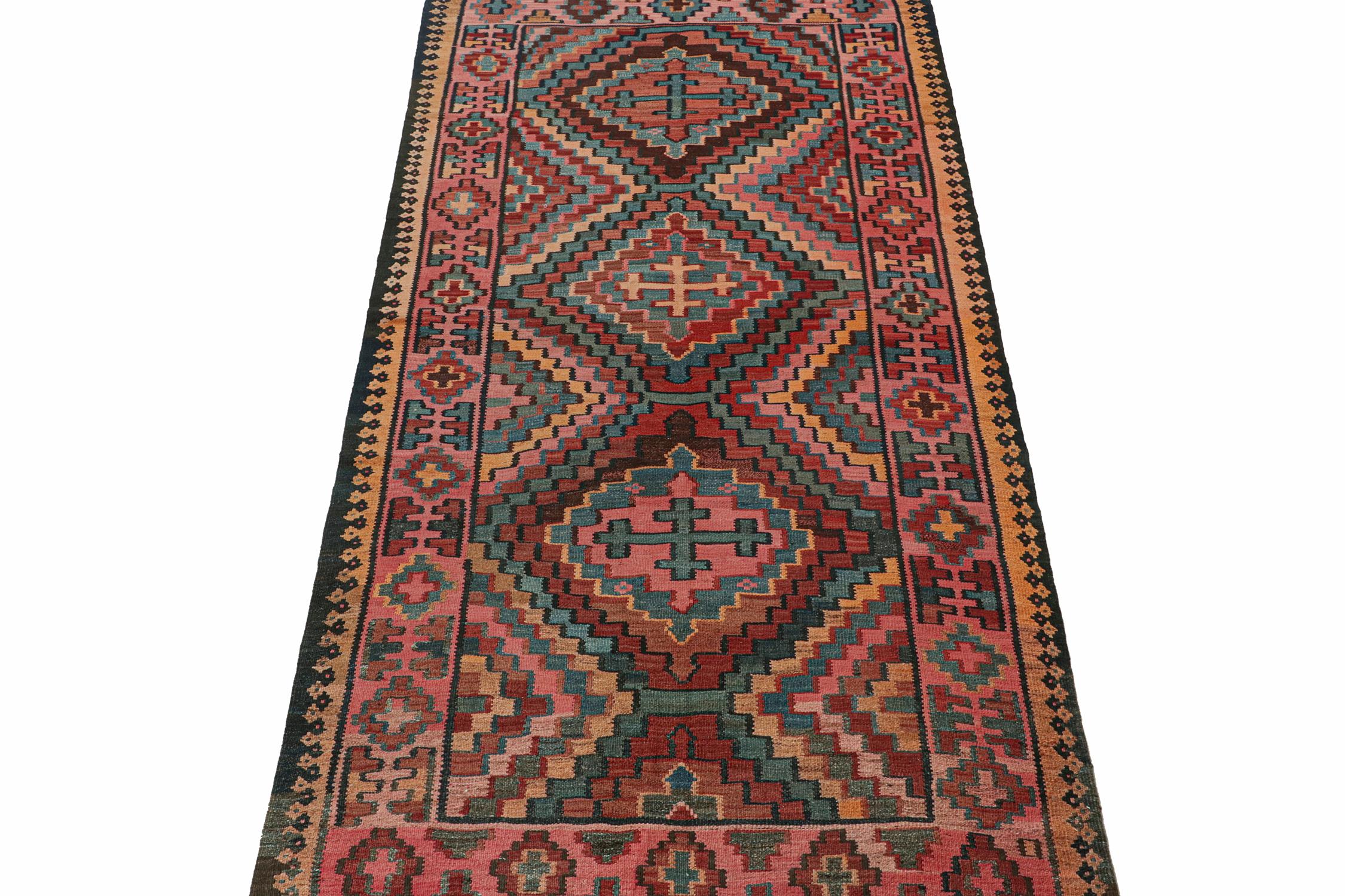 This vintage 5x11 Persian Kilim is an outstanding new addition of Bidjar provenance in Rug & Kilim's rare tribal curations. Handwoven in wool circa 1950-1960.

Further on the Design: 

Bidjar Kilims like this are reputed for their durability and