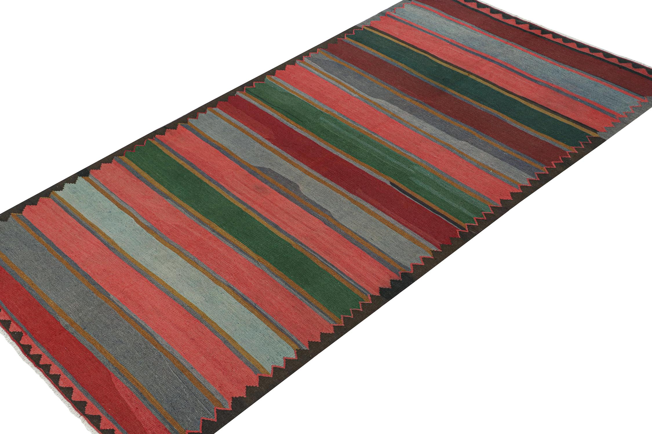 This vintage 5x11 Persian Kilim is a new addition of Bidjar provenance in Rug & Kilim's rare tribal curations. Handwoven in wool circa 1950-1960.

Further on the Design: 

Bidjar Kilims like this are reputed for their durability and distinct